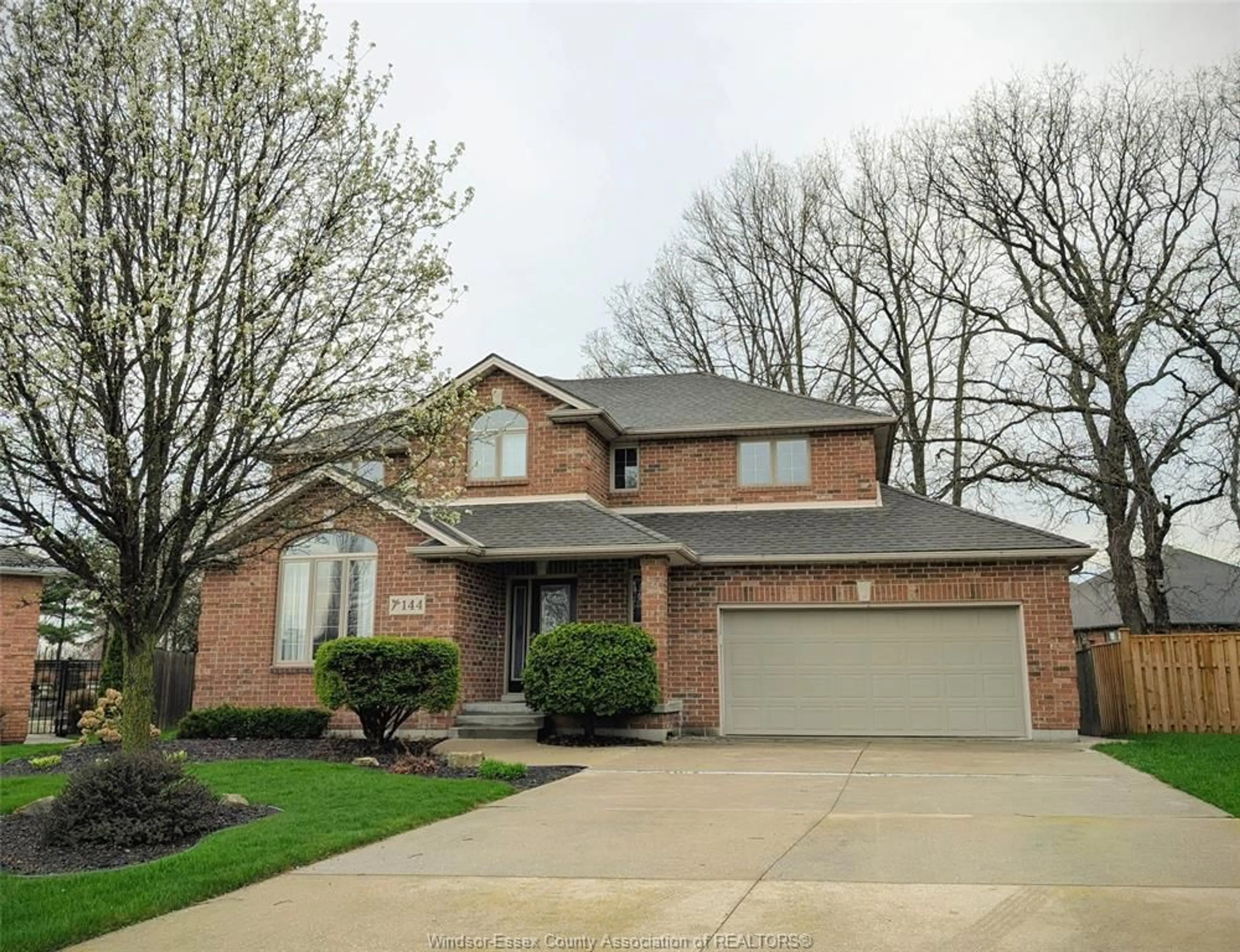 Home with brick exterior material, street for 144 Pheasant Run, Lakeshore Ontario N8L 0Z7