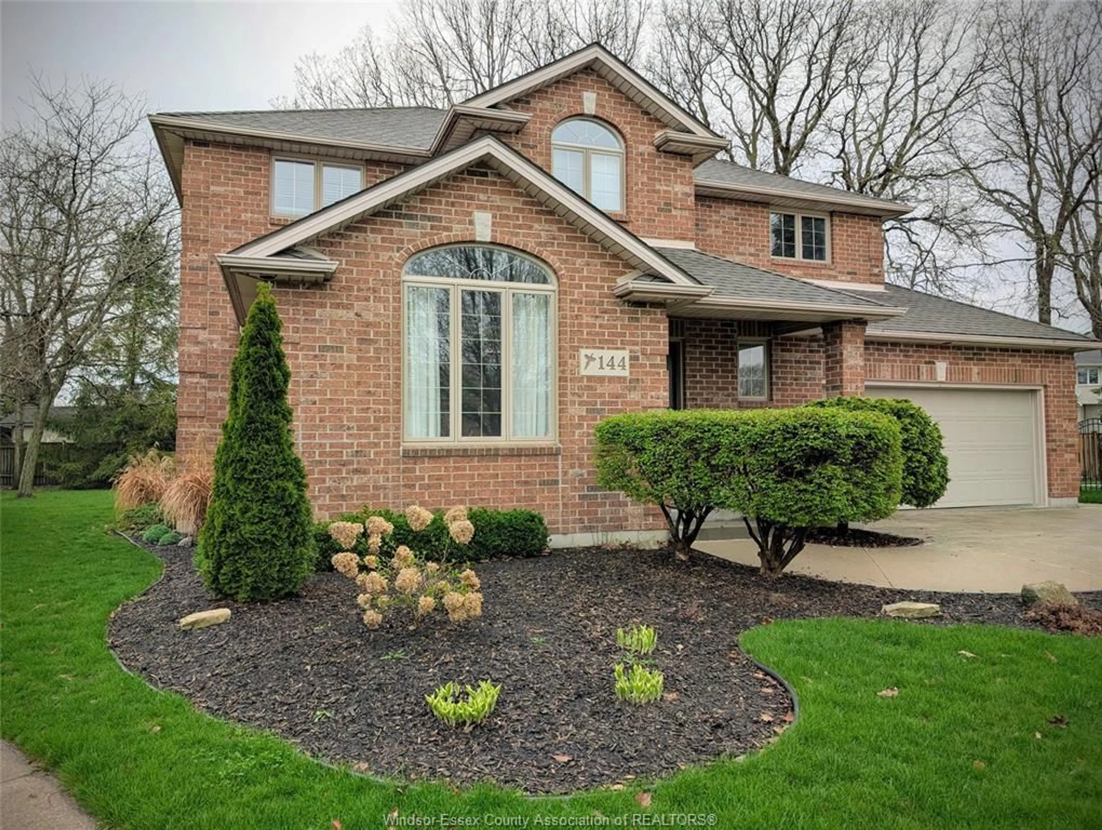 Home with brick exterior material, street for 144 Pheasant Run, Lakeshore Ontario N8L 0Z7