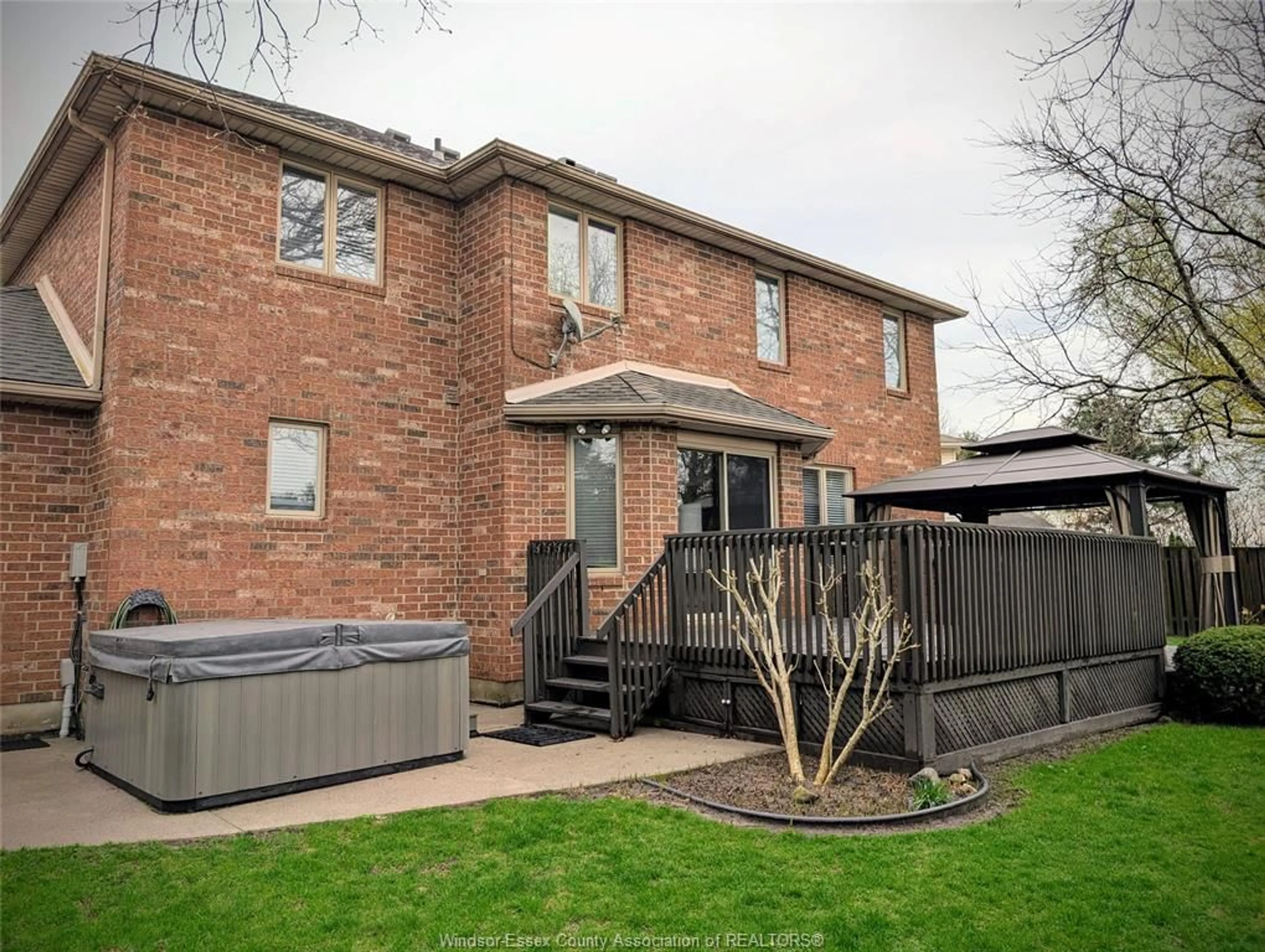 Home with brick exterior material, street for 144 Pheasant Run, Lakeshore Ontario N8L 0Z7