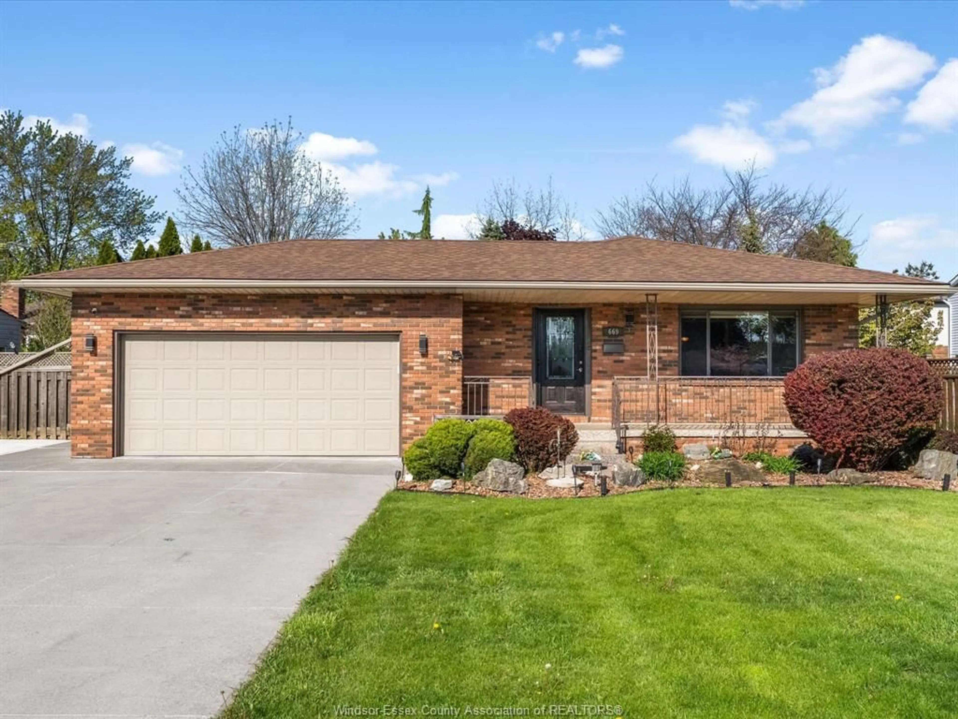 Home with brick exterior material, street for 669 Lesperance Rd, Tecumseh Ontario N8N 3Y8