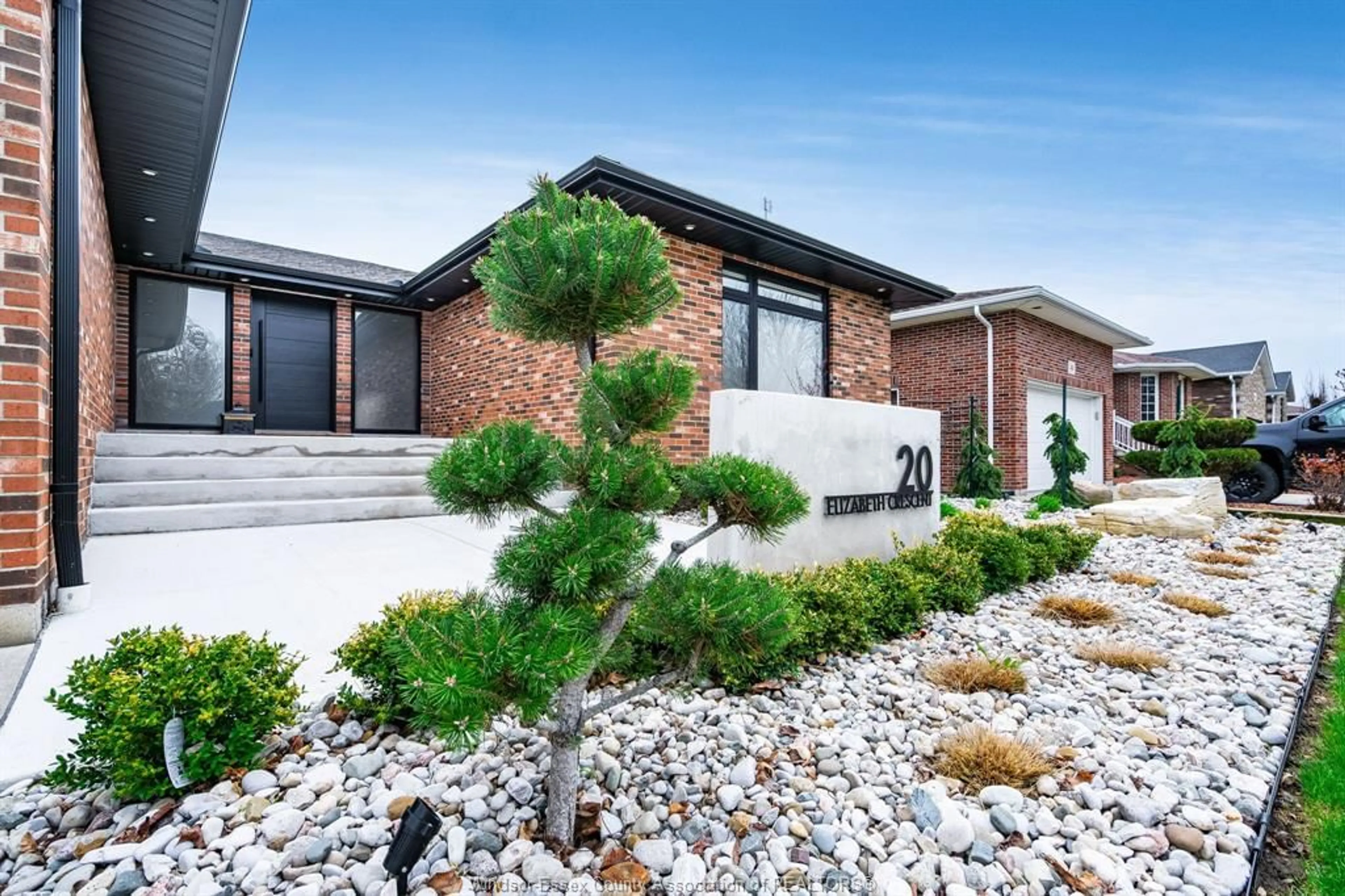 Home with brick exterior material, street for 20 Elizabeth Cres, Leamington Ontario N8H 4Y1