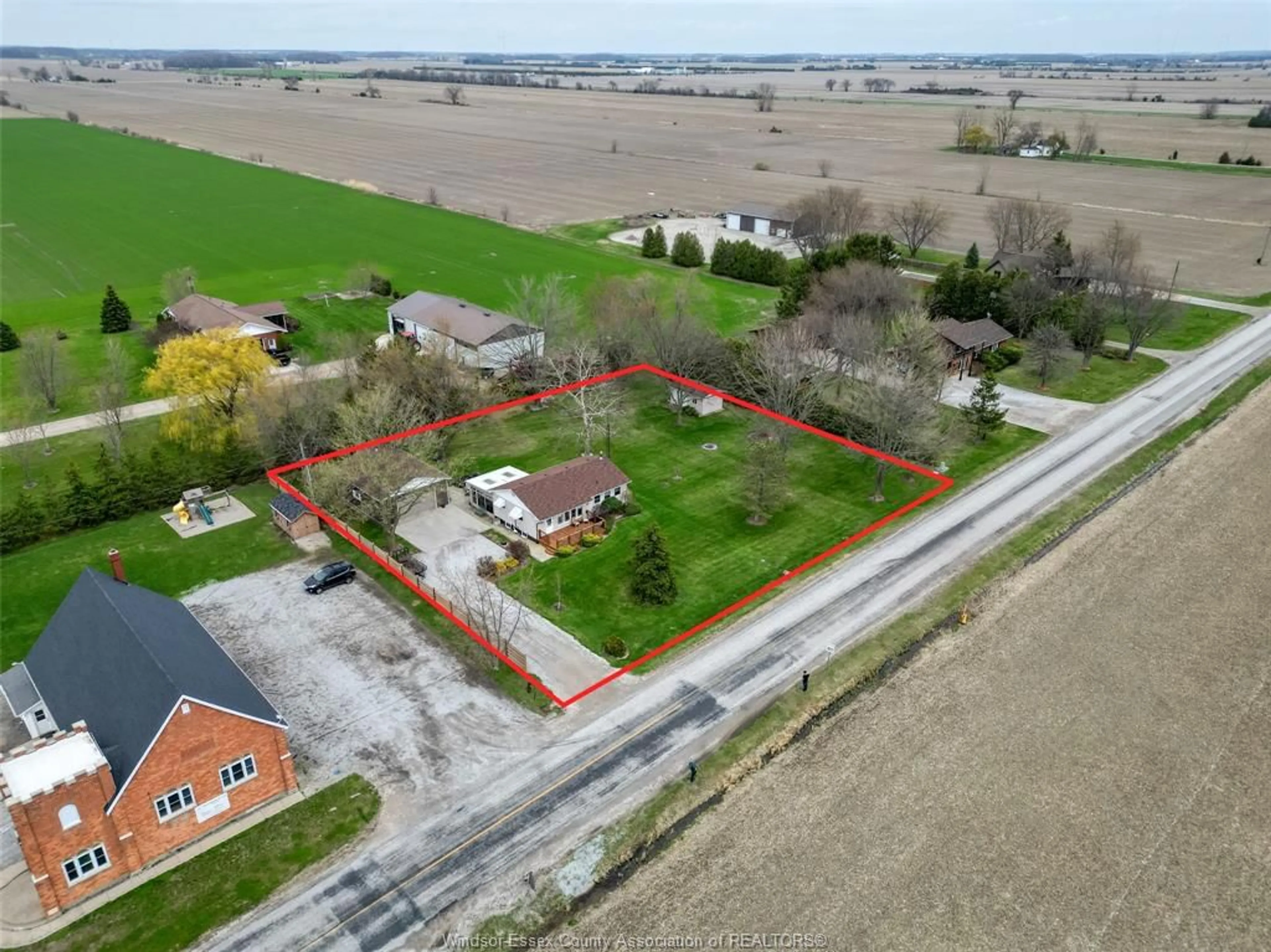 A pic from outside/outdoor area/front of a property/back of a property/a pic from drone, building for 1303 MERSEA RD 8, Leamington Ontario N0P 2P0