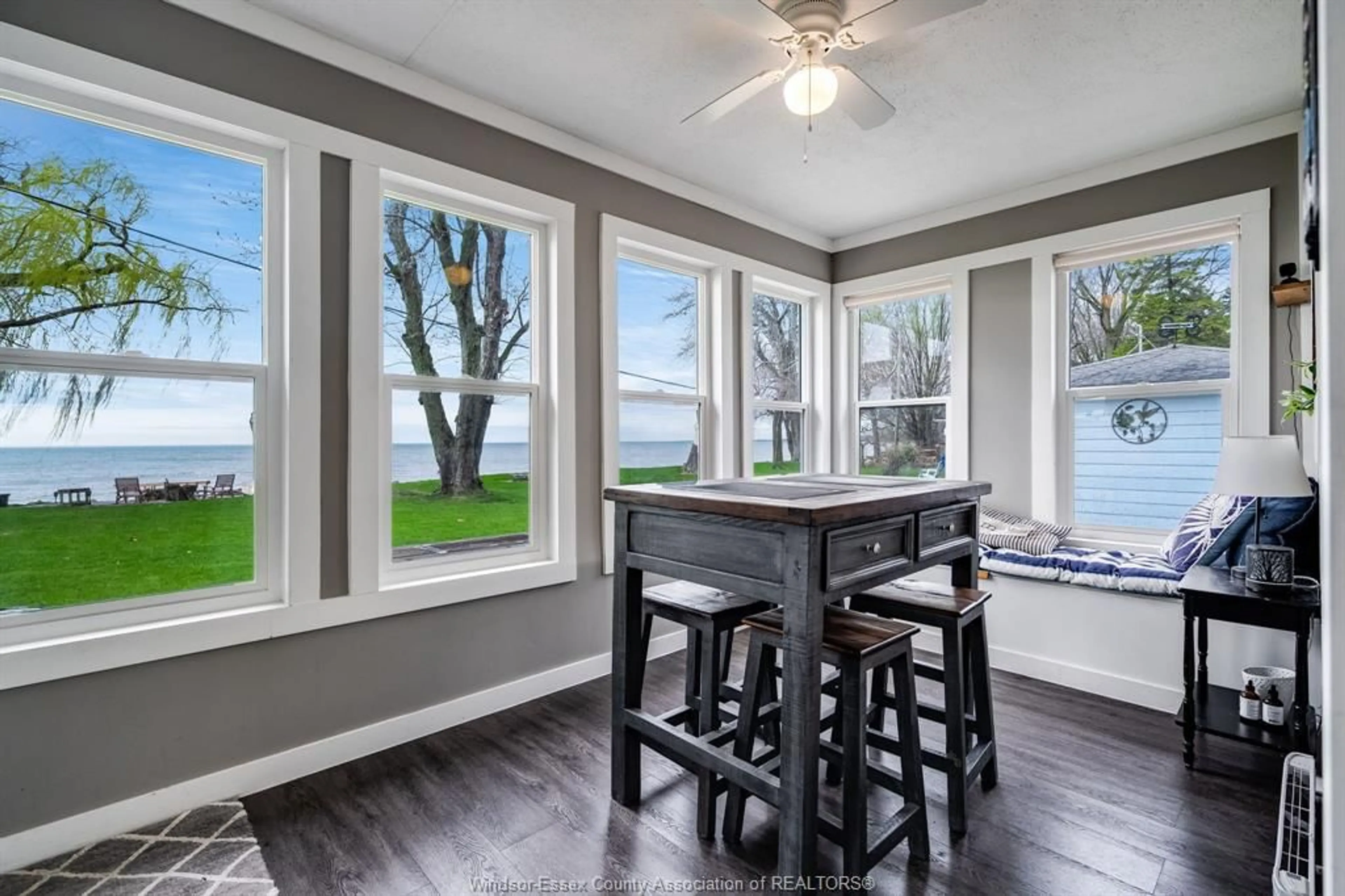 Open concept kitchen, wood/laminate floor for 306 Detroit Line, Wheatley Ontario N0P 2P0