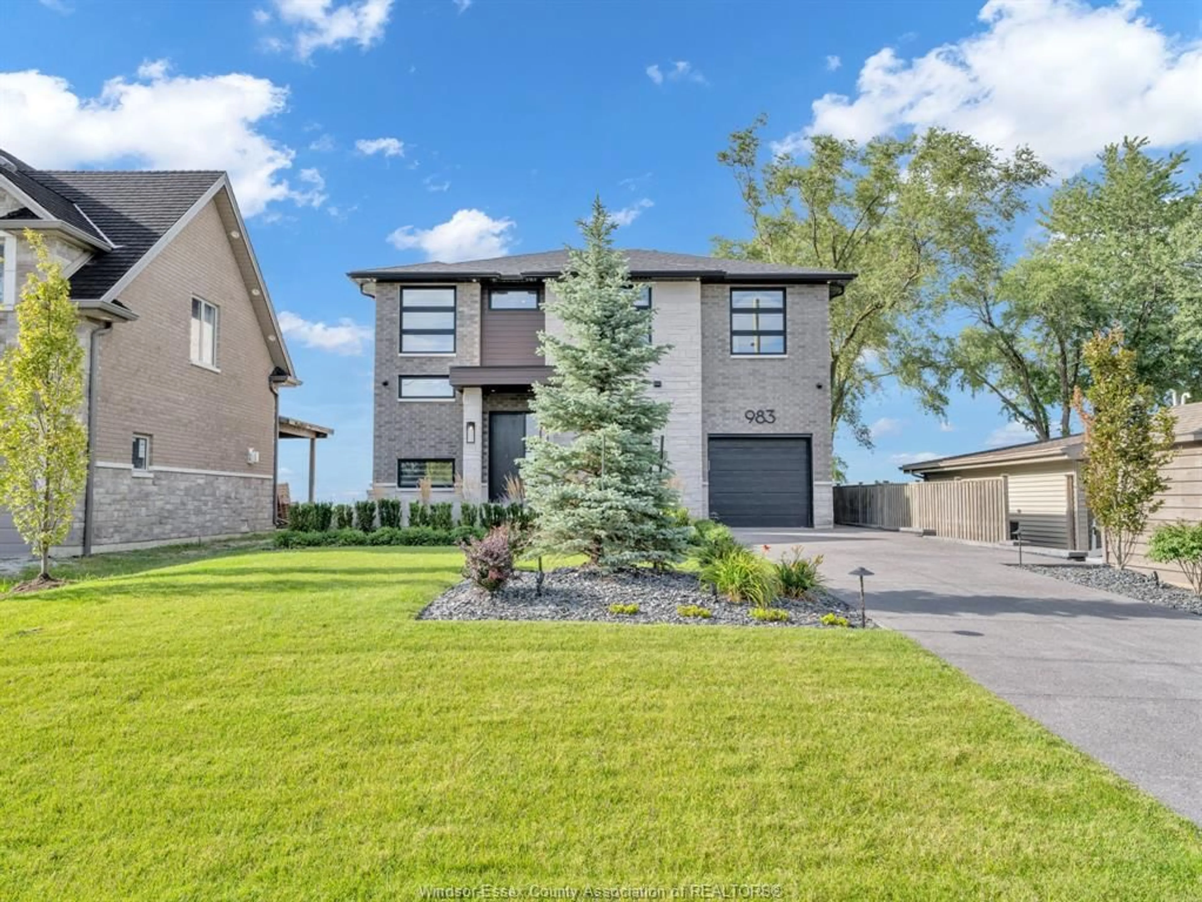 Home with brick exterior material, street for 983 LAKESHORE PARK Rd, Lakeshore Ontario N0R 1A0