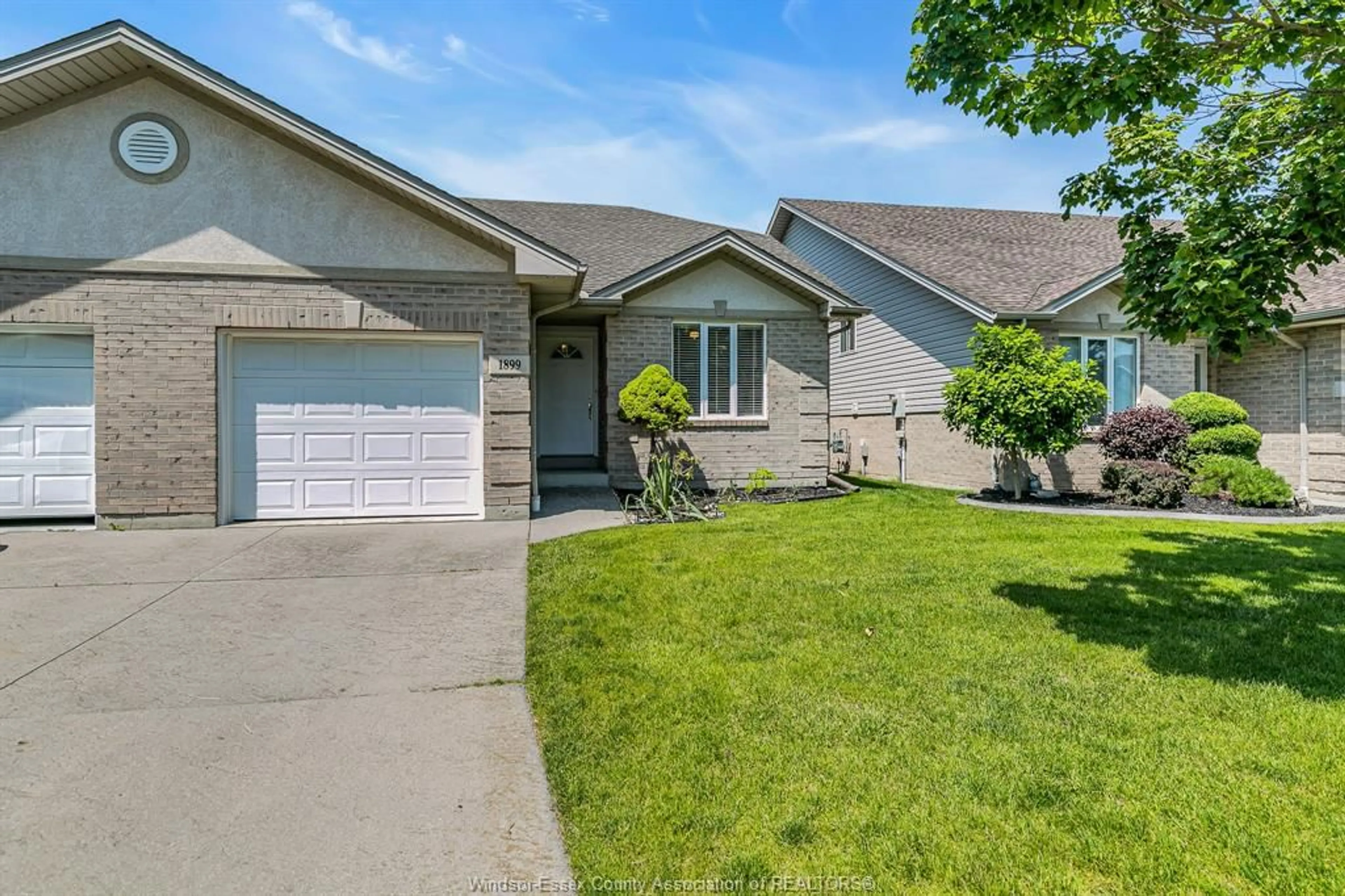 Home with vinyl exterior material, street for 1899 CASTLETON Ave, Windsor Ontario N8P 1P6