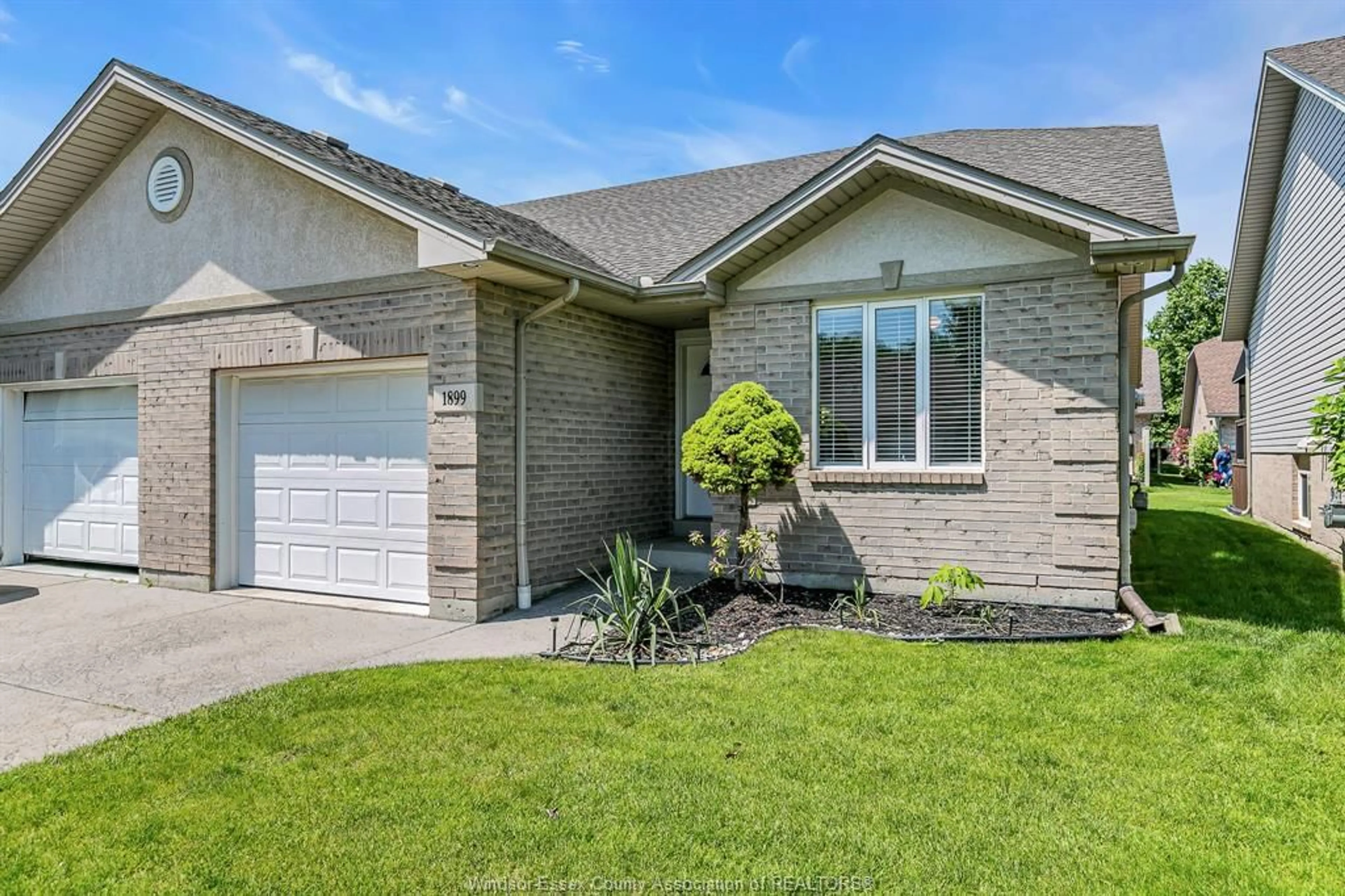 Home with brick exterior material, street for 1899 CASTLETON Ave, Windsor Ontario N8P 1P6