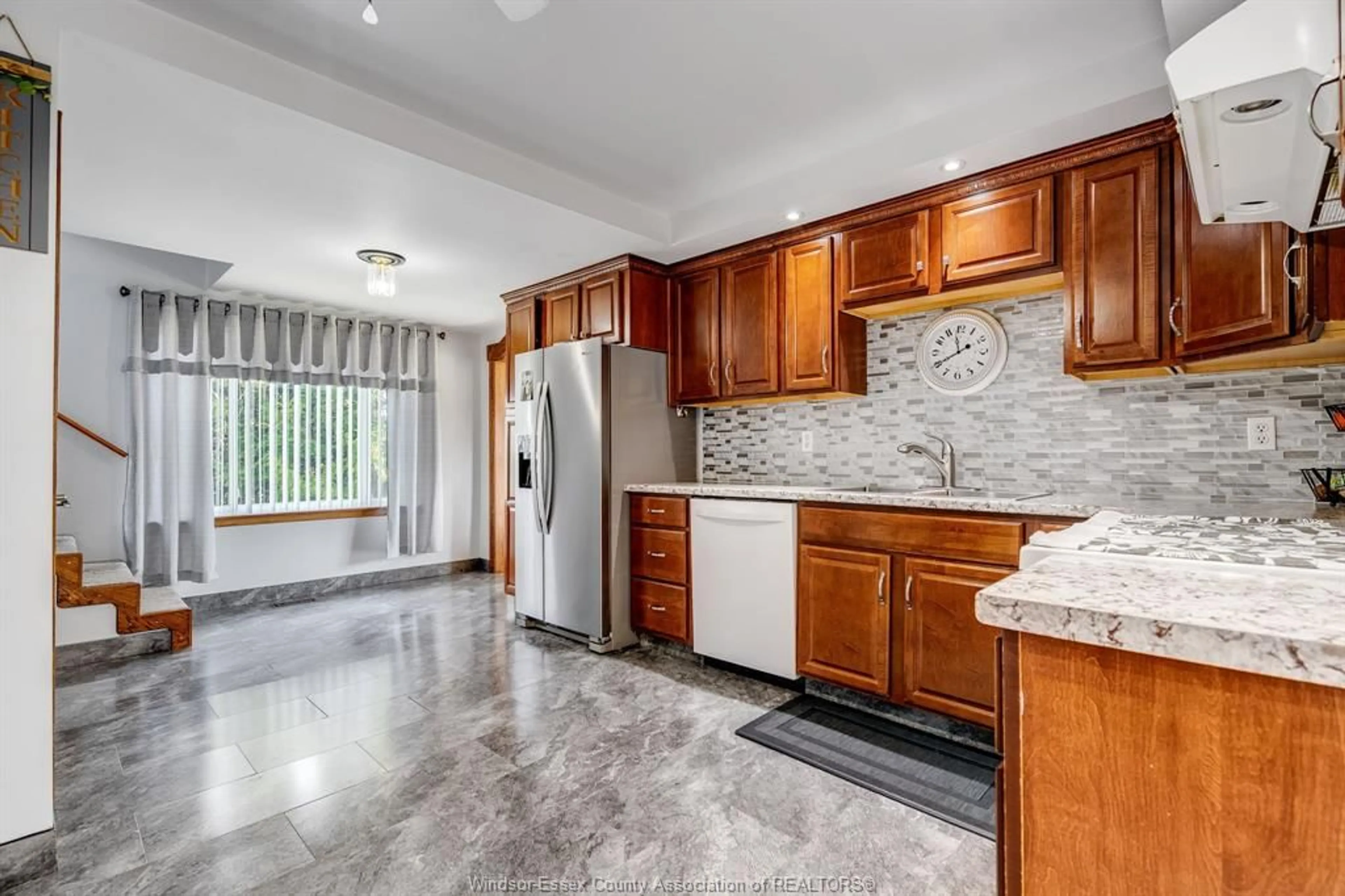 Open concept kitchen, ceramic/tile floor for 881 Talbot Trail, Wheatley Ontario N0P 2P0