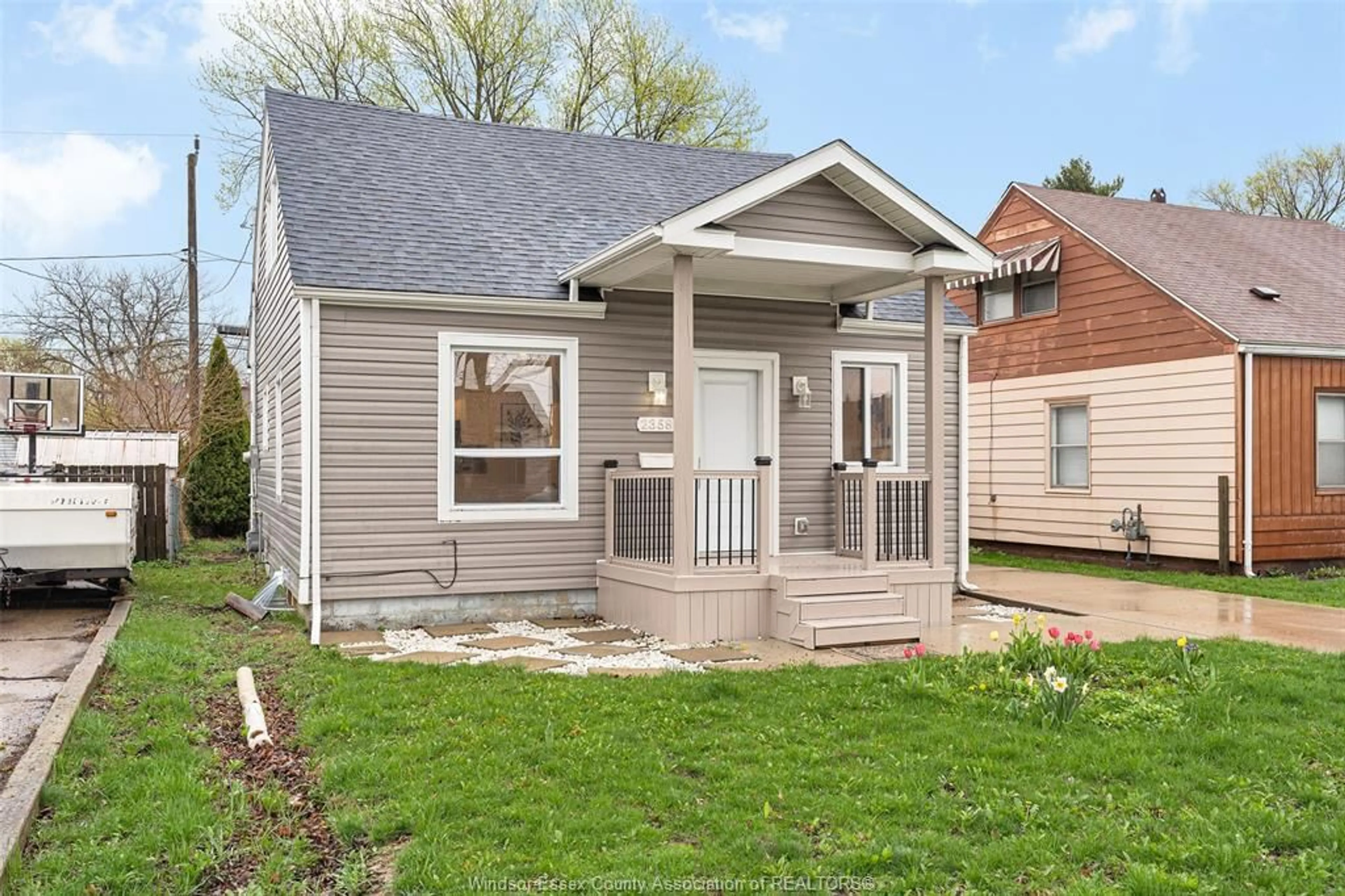 Home with vinyl exterior material, street for 2358 LOUIS Ave, Windsor Ontario N8W 2B6