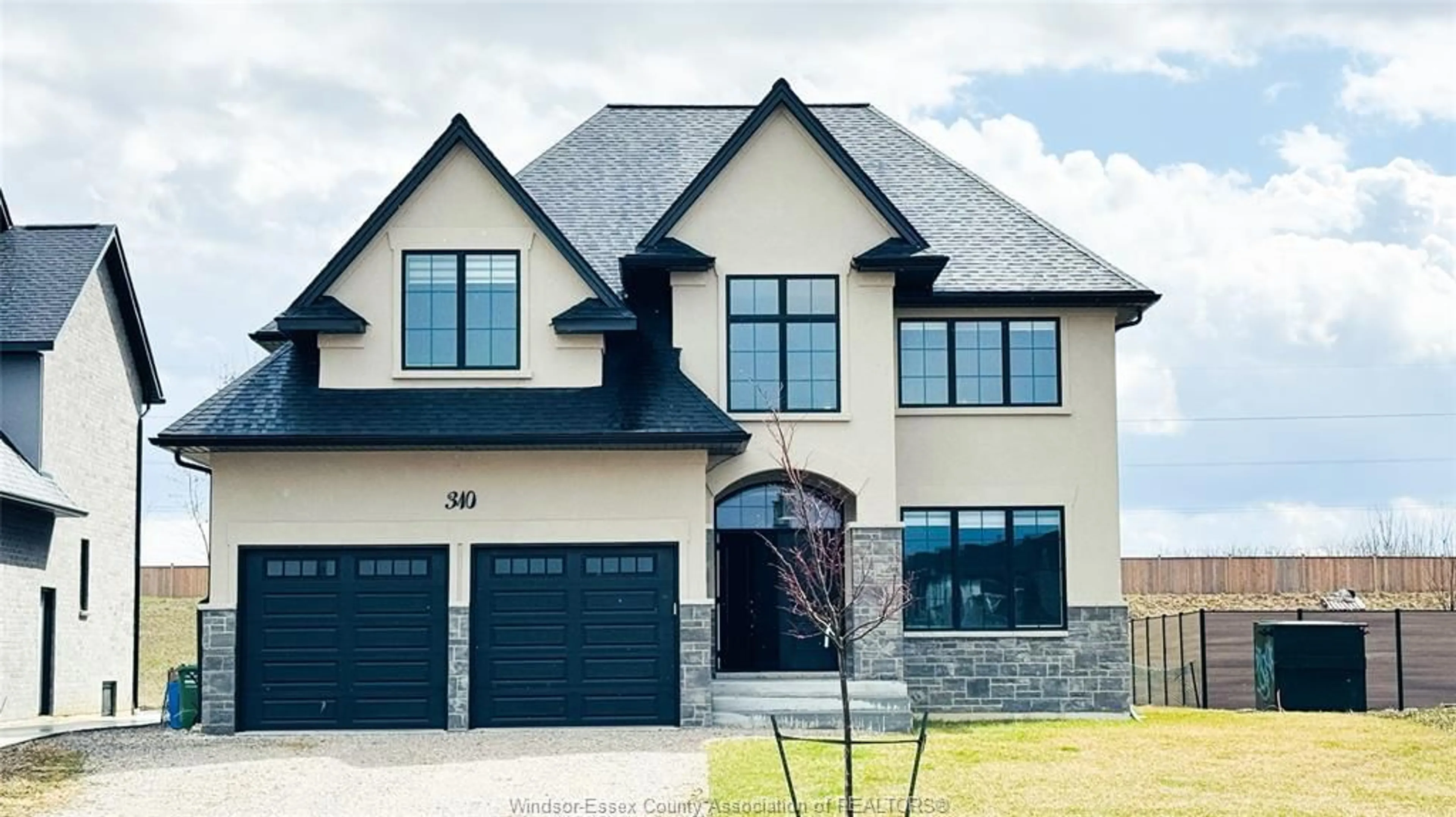 Home with brick exterior material, street for 310 BLAKE Ave, Belle River Ontario N8L 1B6