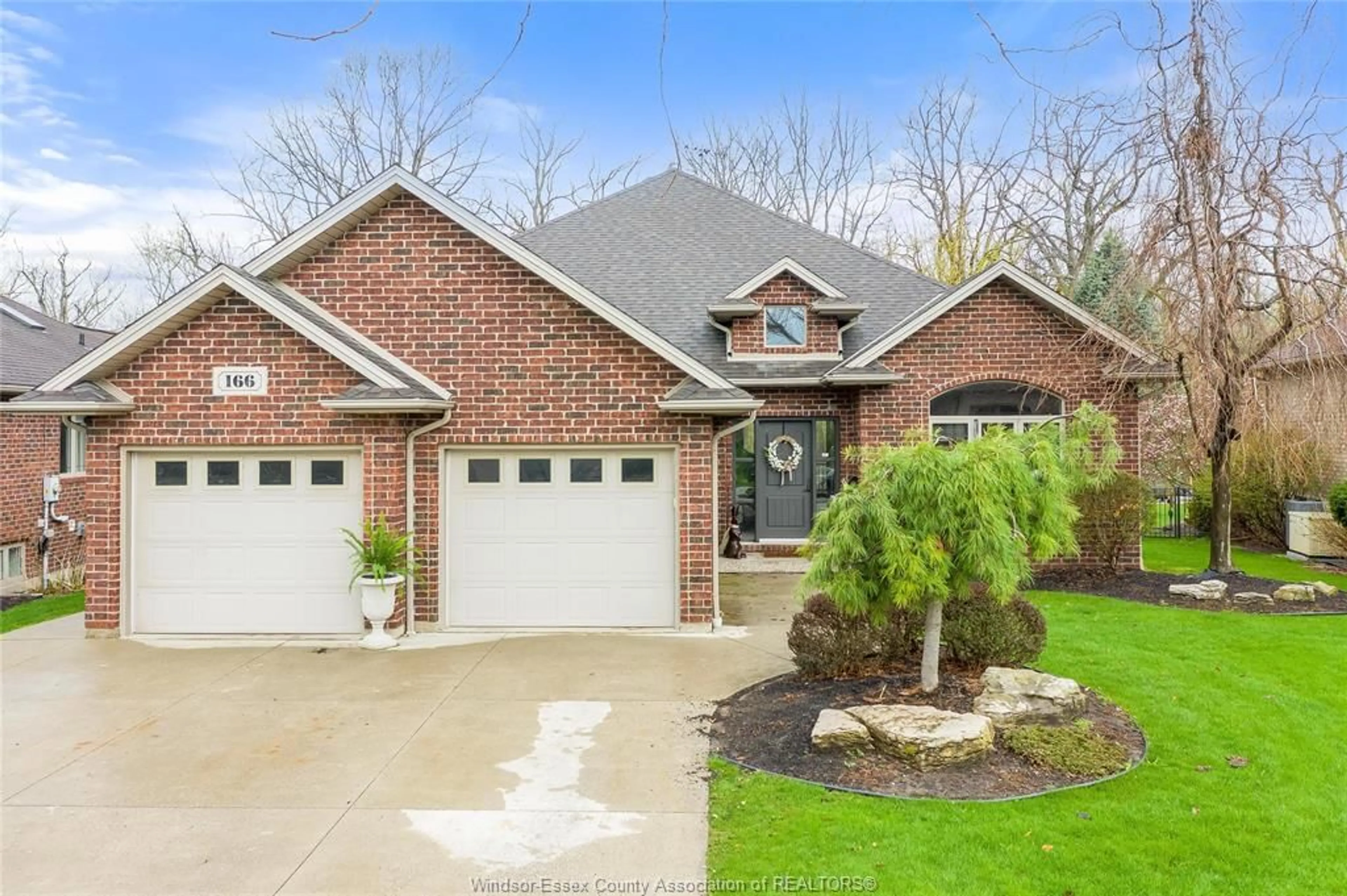 Home with brick exterior material, street for 166 WOODYCREST, Kingsville Ontario N9Y 0A4