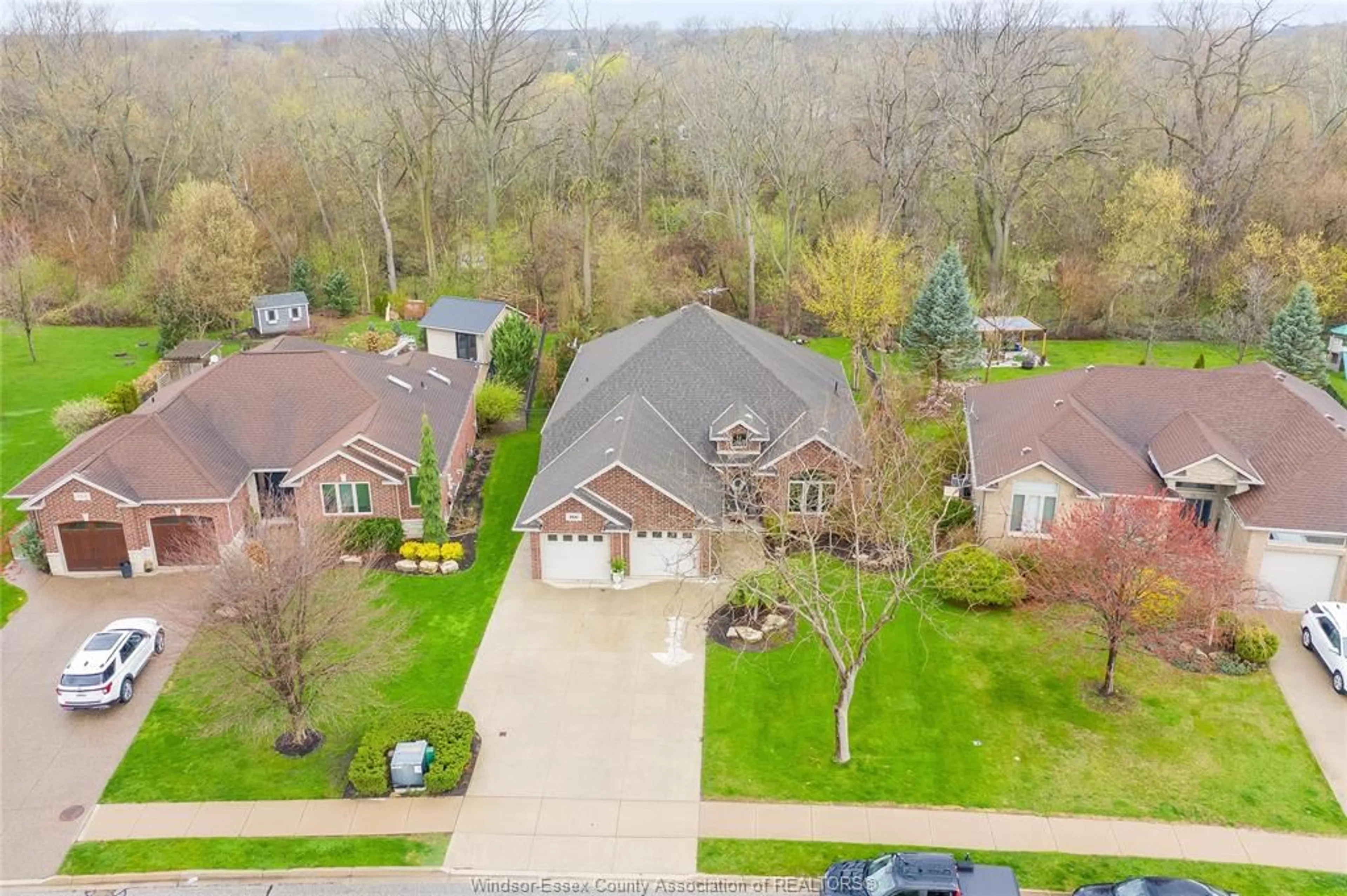 A pic from outside/outdoor area/front of a property/back of a property/a pic from drone, water/lake/river/ocean view for 166 WOODYCREST, Kingsville Ontario N9Y 0A4