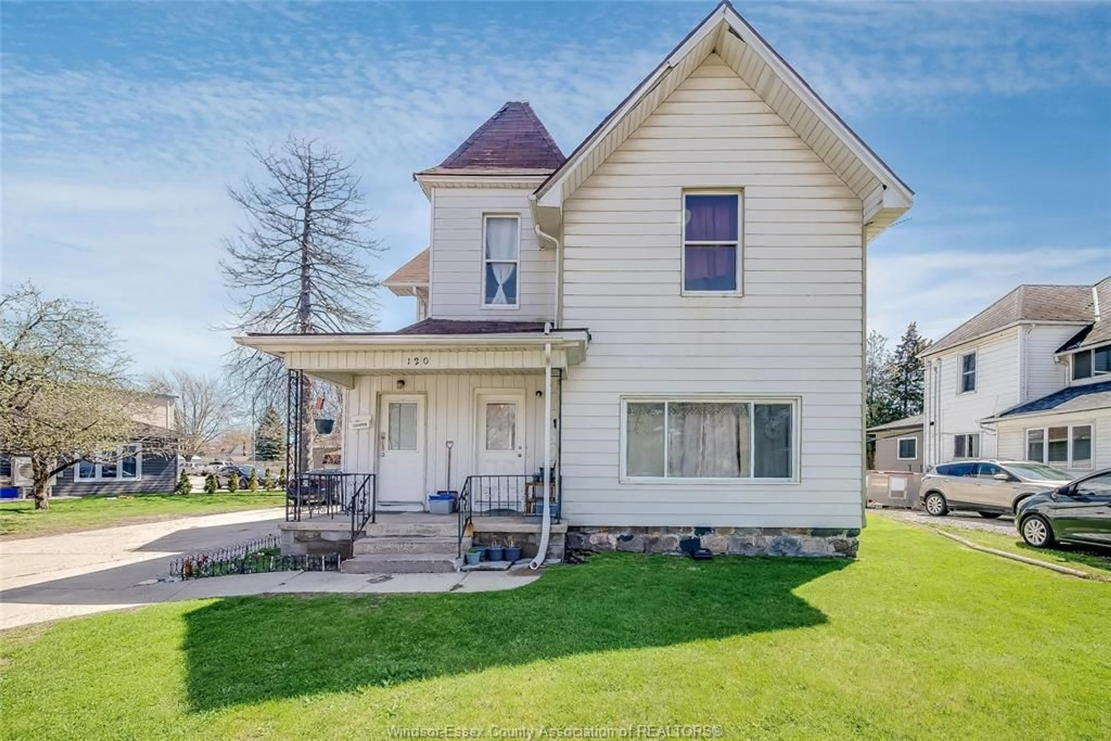 Home with vinyl exterior material, street for 120 TALBOT St, Leamington Ontario N8H 1M9