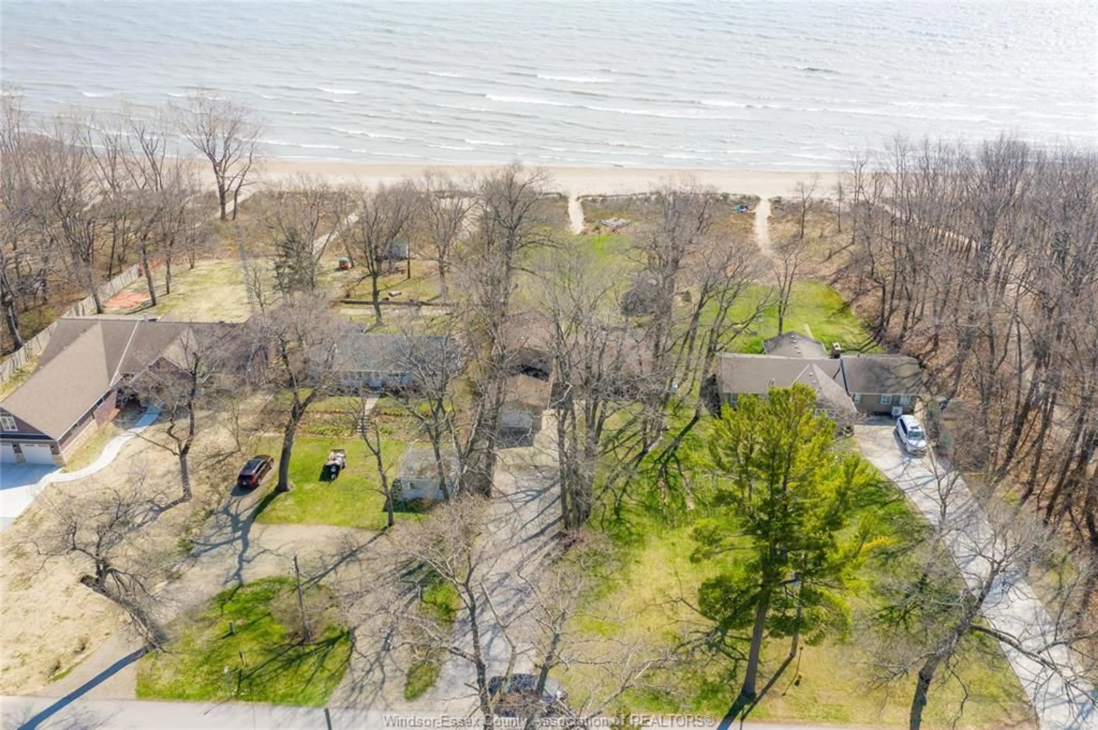 A pic from outside/outdoor area/front of a property/back of a property/a pic from drone, water/lake/river/ocean view for 11604 BATES Line, Rondeau Park Ontario N0P 1X0