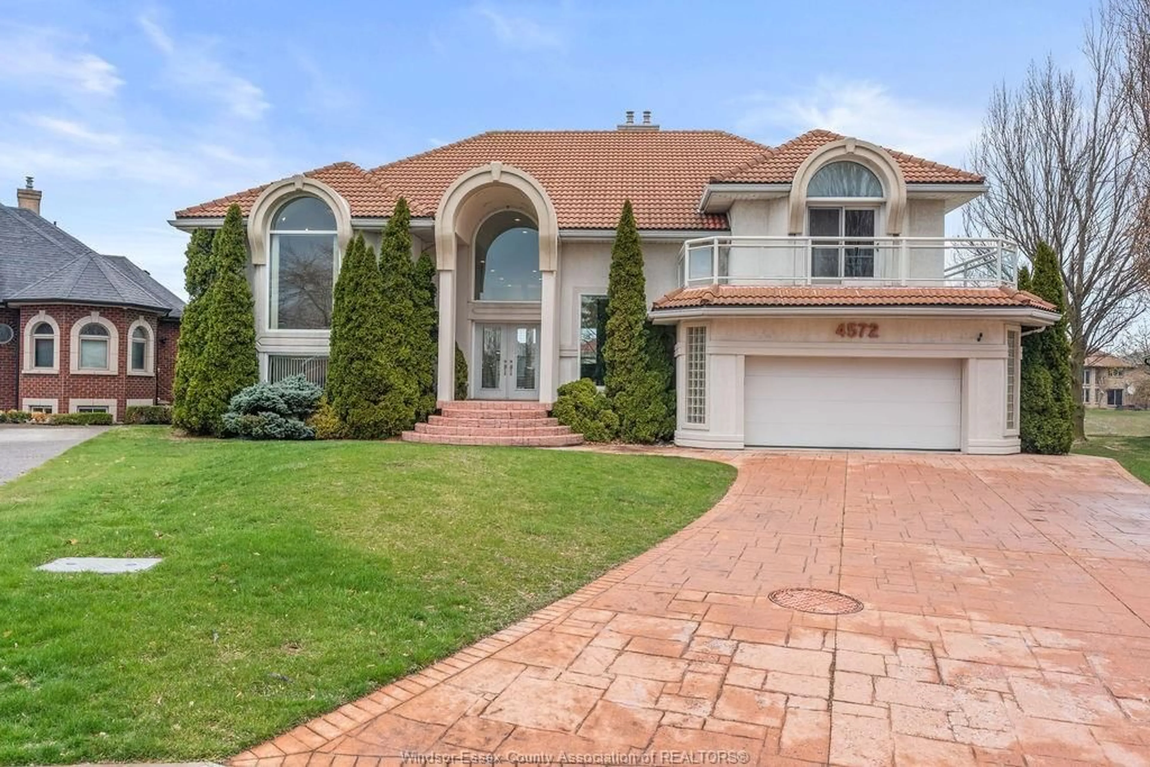 Home with brick exterior material, street for 4572 LAKE GRANDE Crt, Windsor Ontario N9G 2R3