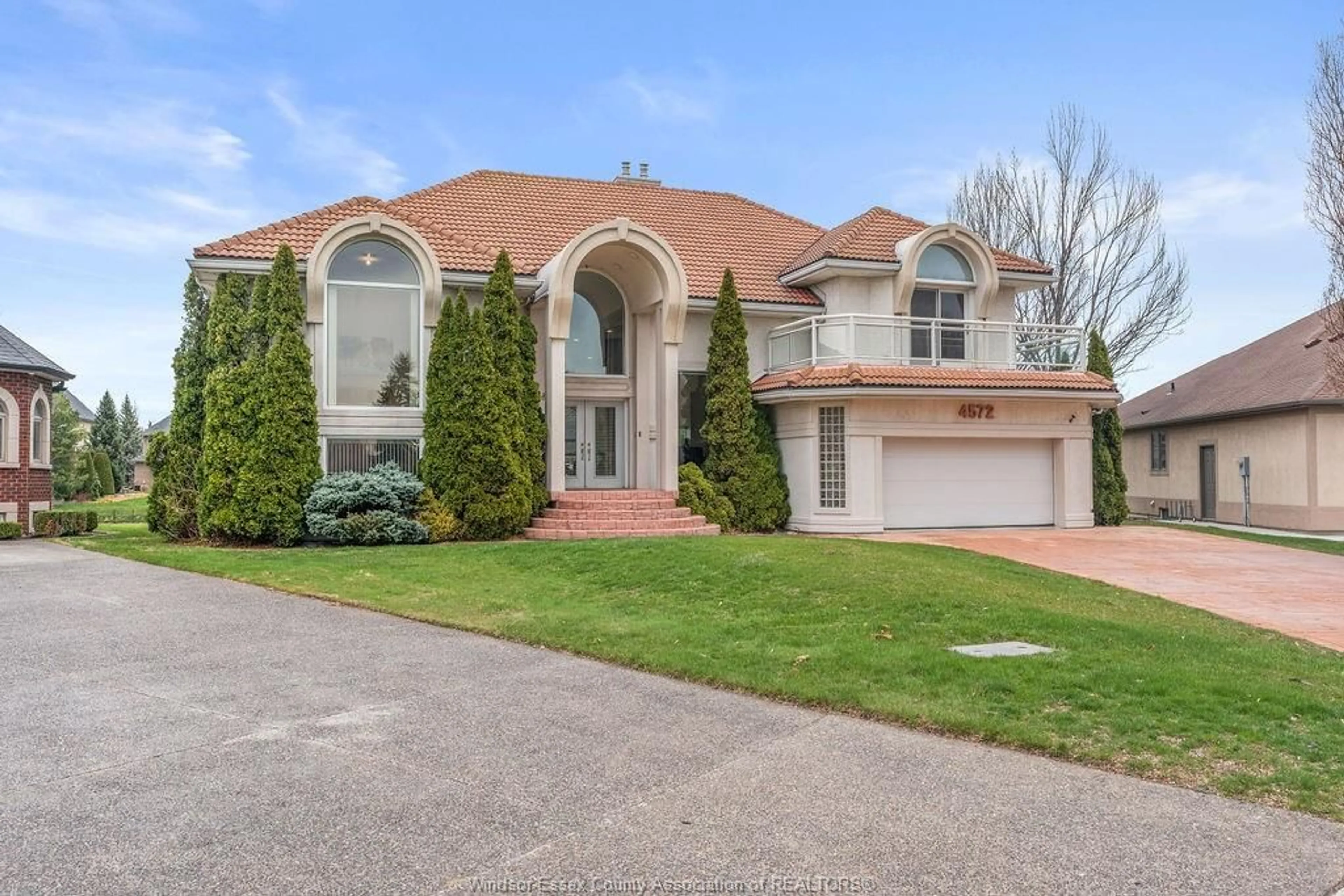 Home with brick exterior material, street for 4572 LAKE GRANDE Crt, Windsor Ontario N9G 2R3