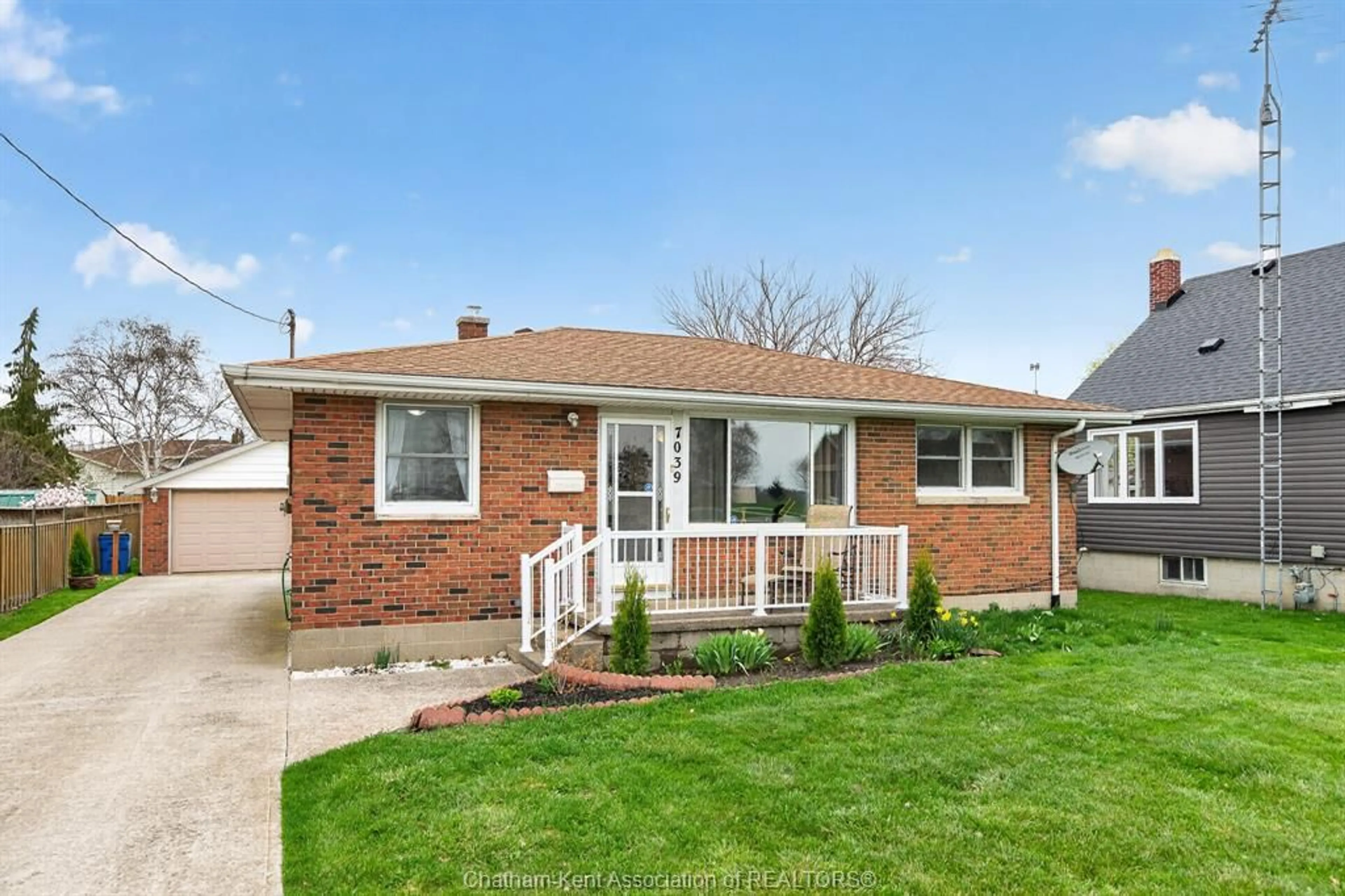 Home with brick exterior material, street for 7039 BASE Line, Wallaceburg Ontario N8A 1A2