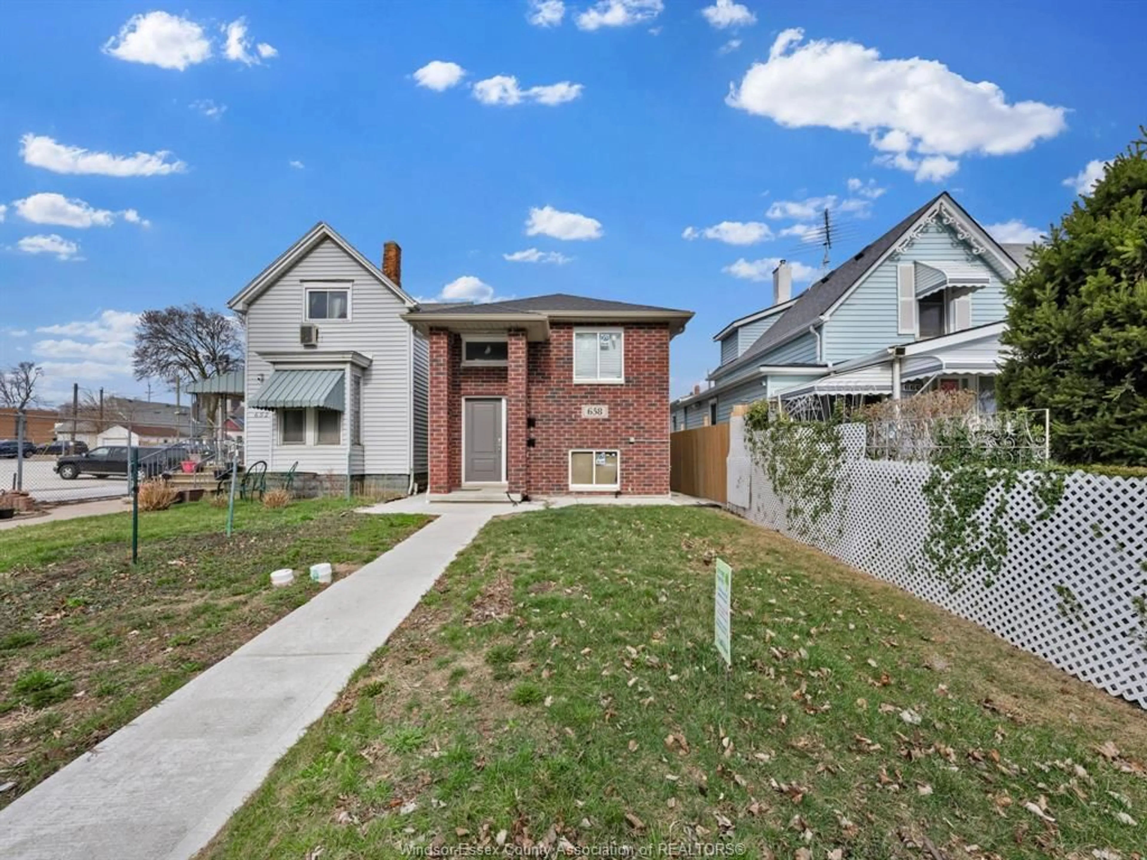 Home with brick exterior material, street for 658 CARON, Windsor Ontario N9A 5B6