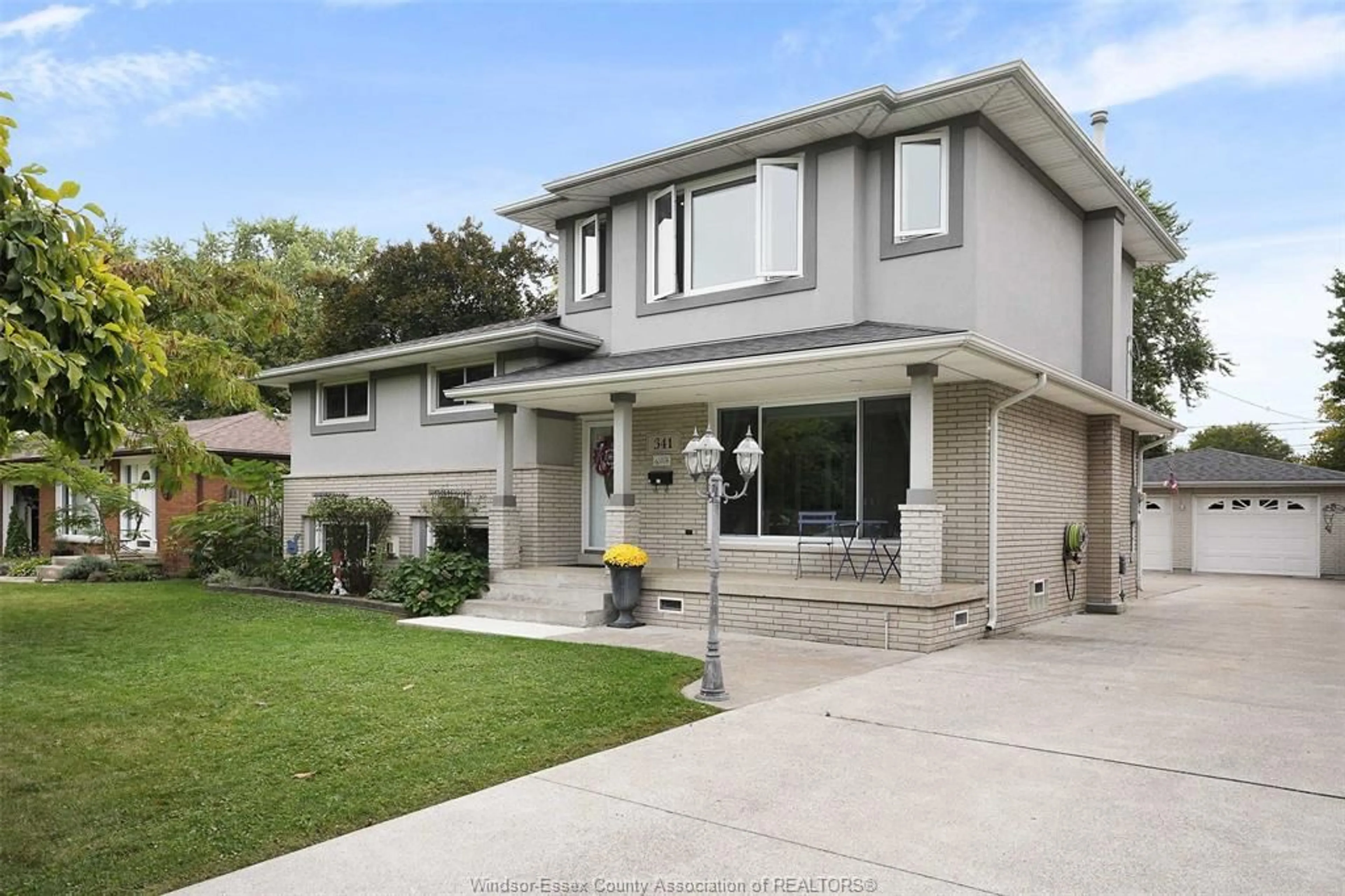 Home with vinyl exterior material, street for 341 GENEVIEVE St, Windsor Ontario N8S 3V7