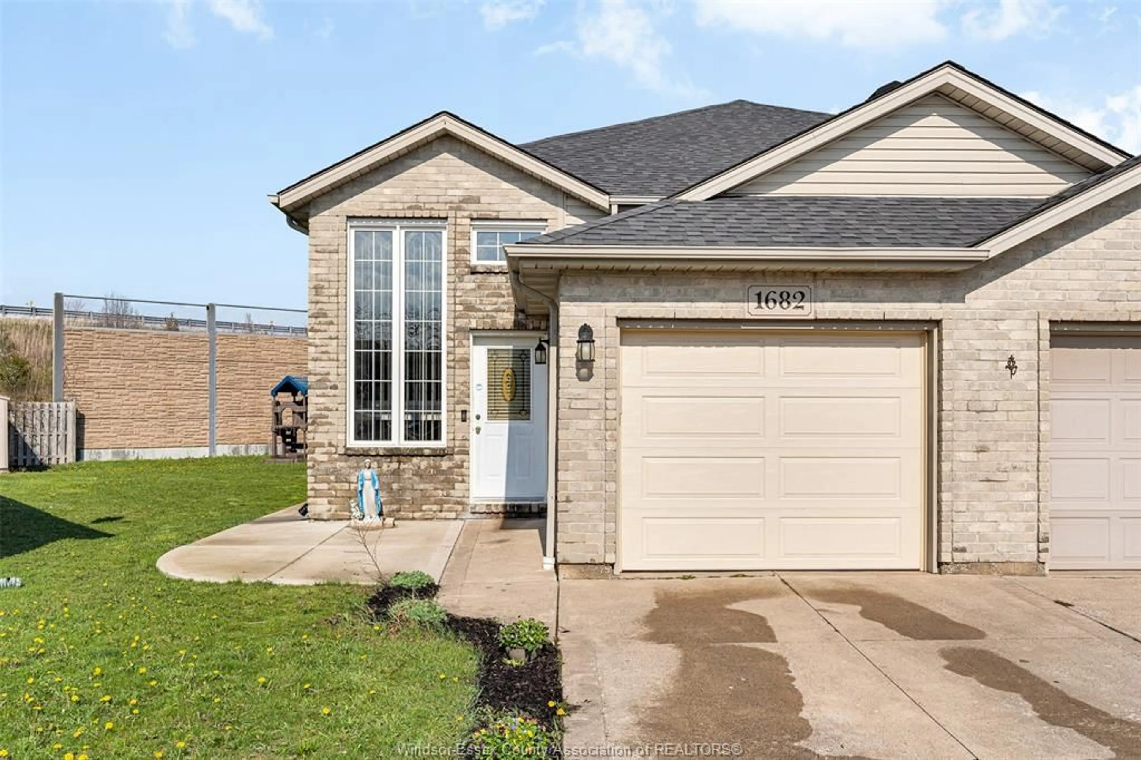 Home with brick exterior material, street for 1682 SAGEBRUSH, Windsor Ontario N9G 3B8