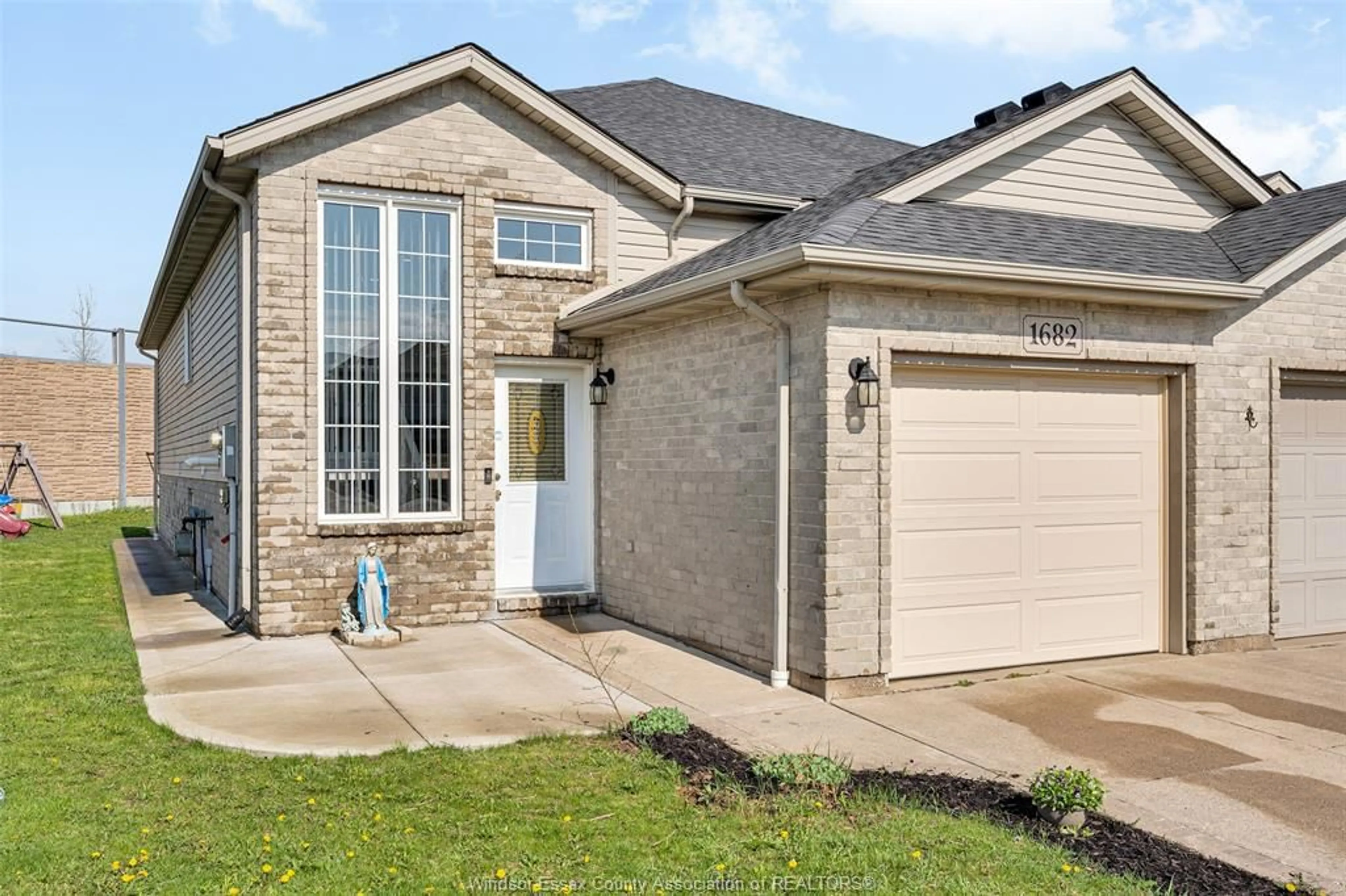 Home with brick exterior material, street for 1682 SAGEBRUSH, Windsor Ontario N9G 3B8