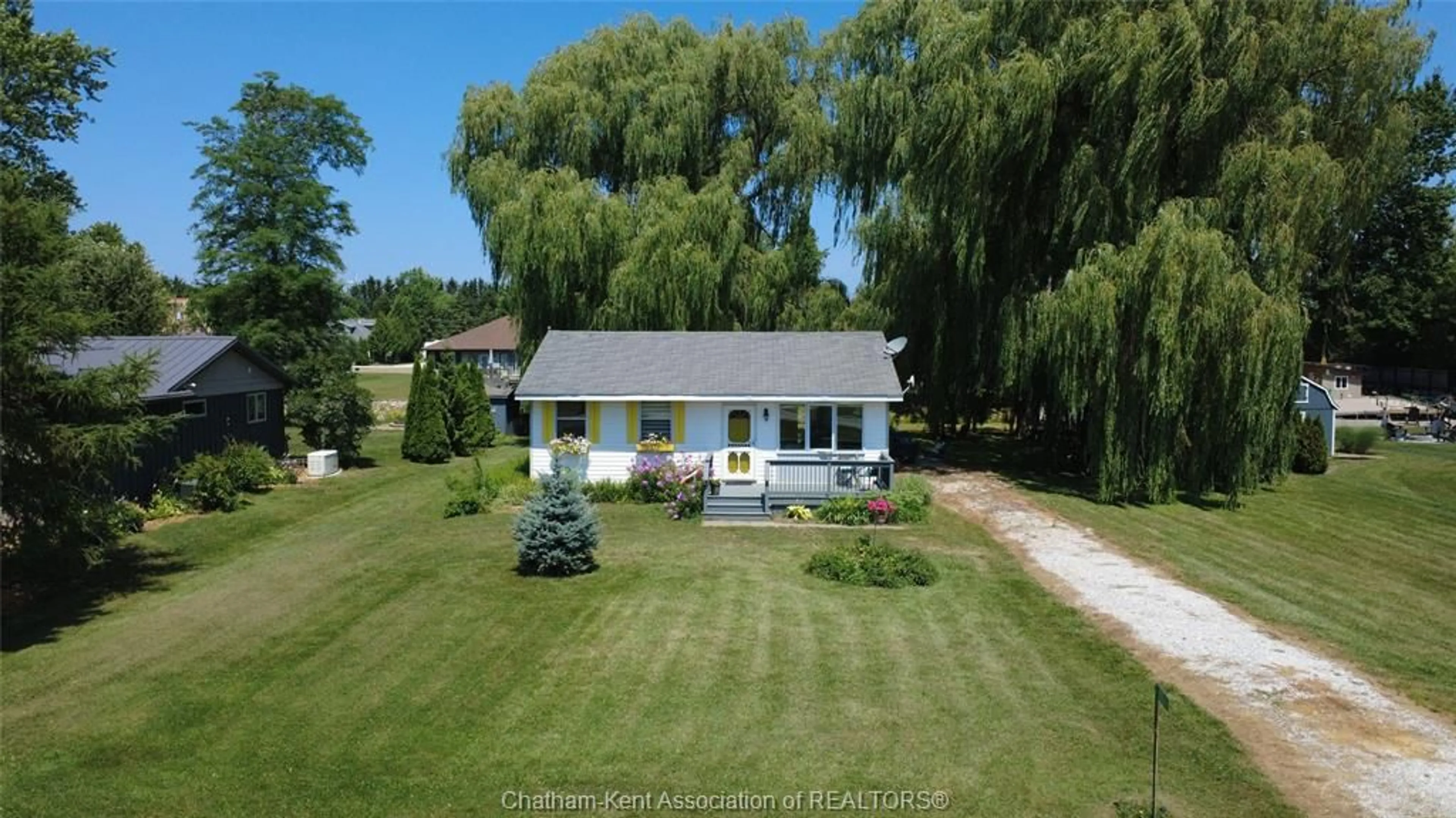 A pic from outside/outdoor area/front of a property/back of a property/a pic from drone, water/lake/river/ocean view for 11527 LAGONDA Way, Rondeau Bay Estates Ontario N0P 1X0