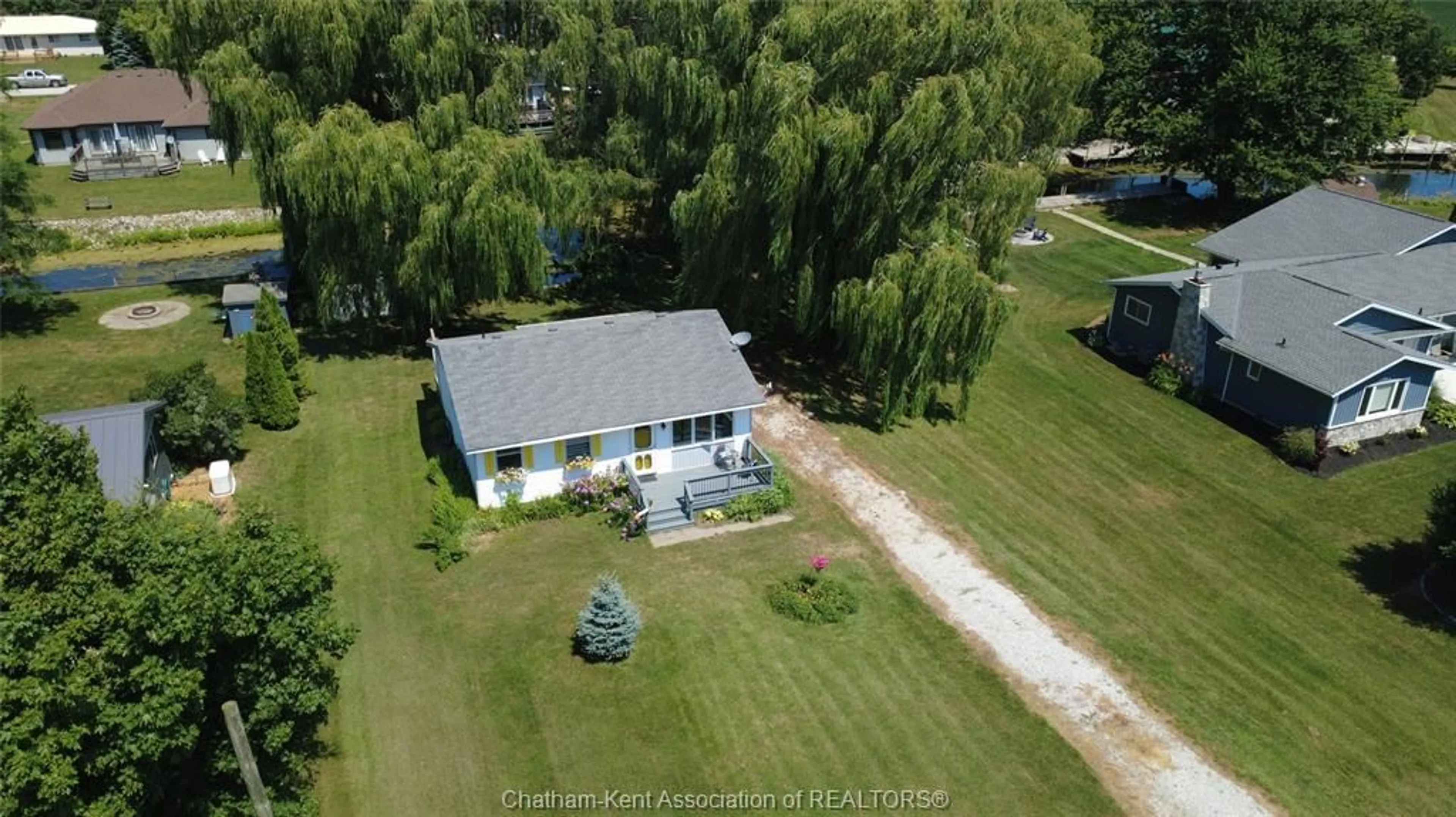 A pic from outside/outdoor area/front of a property/back of a property/a pic from drone, water/lake/river/ocean view for 11527 LAGONDA Way, Rondeau Bay Estates Ontario N0P 1X0