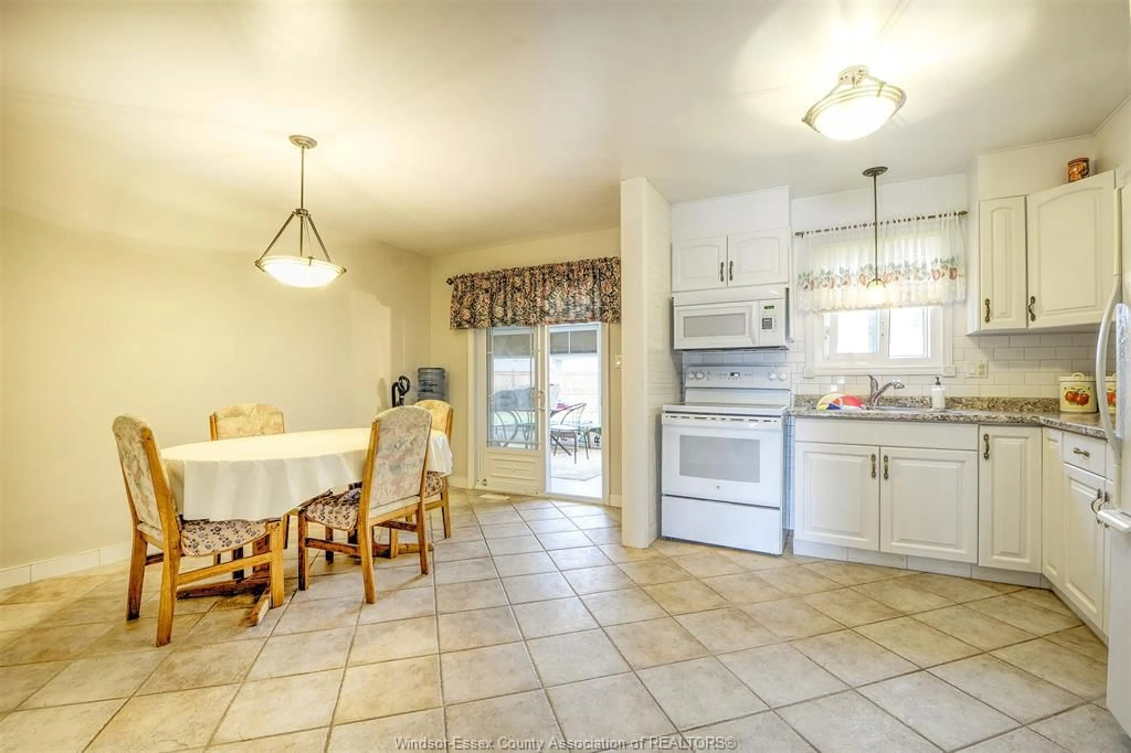 Open concept kitchen, ceramic/tile floor for 9445 ALTEN Dr, Windsor Ontario N8R 1V9