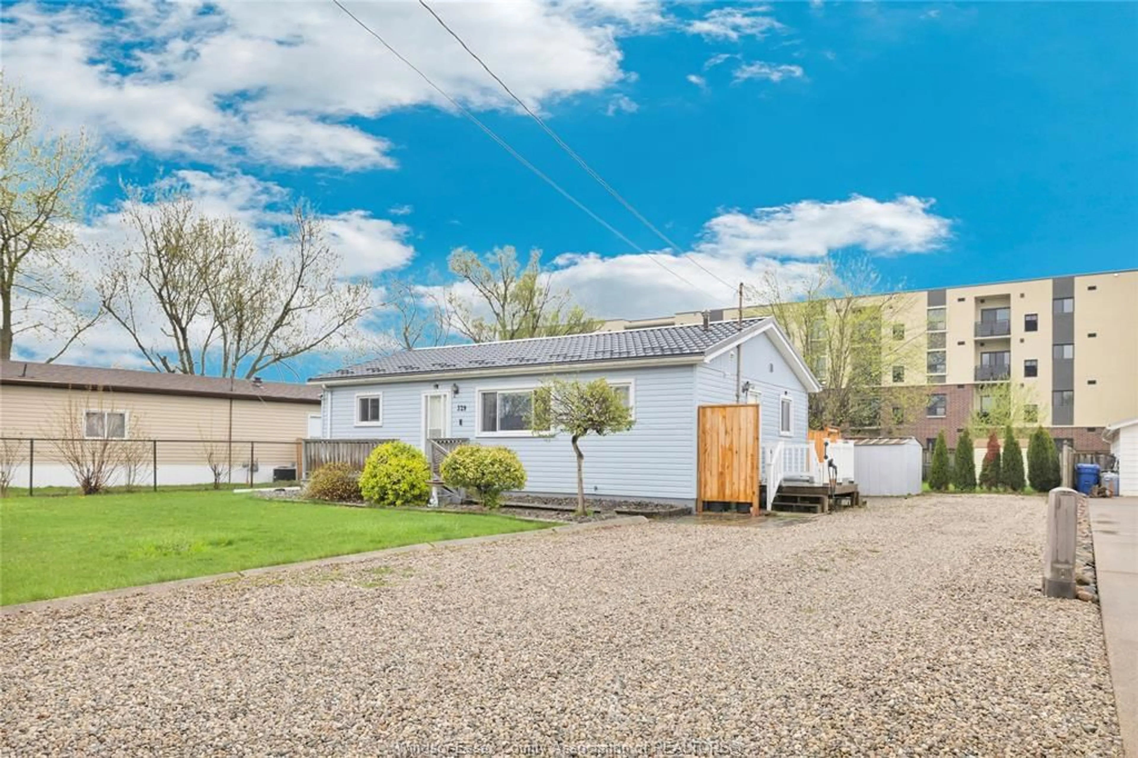 A pic from outside/outdoor area/front of a property/back of a property/a pic from drone, street for 329 PARKSIDE Dr, McGregor Ontario N0R 1J0