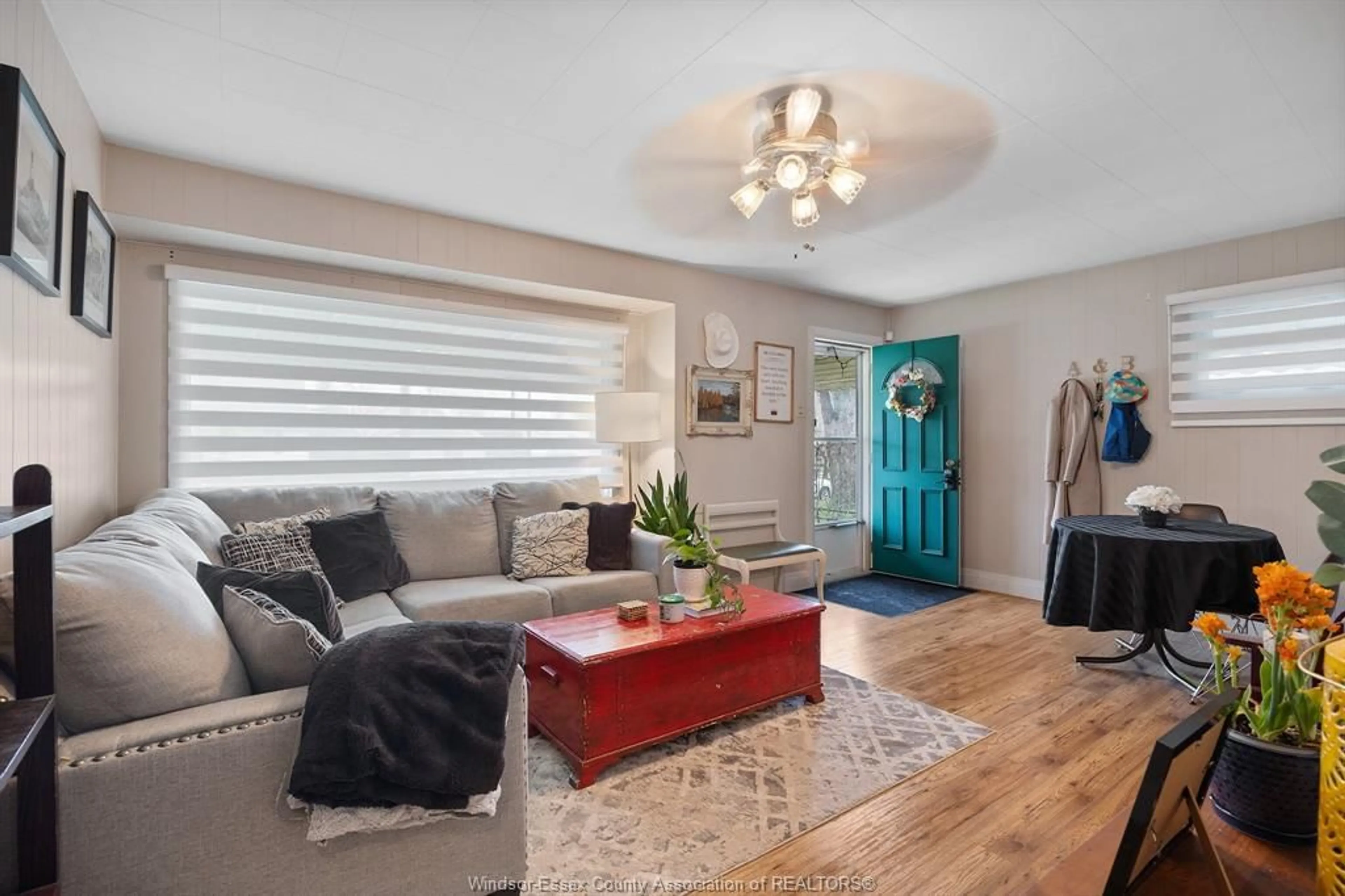 Living room with furniture, wood/laminate floor for 1385 ROSSINI, Windsor Ontario N8Y 2Z6