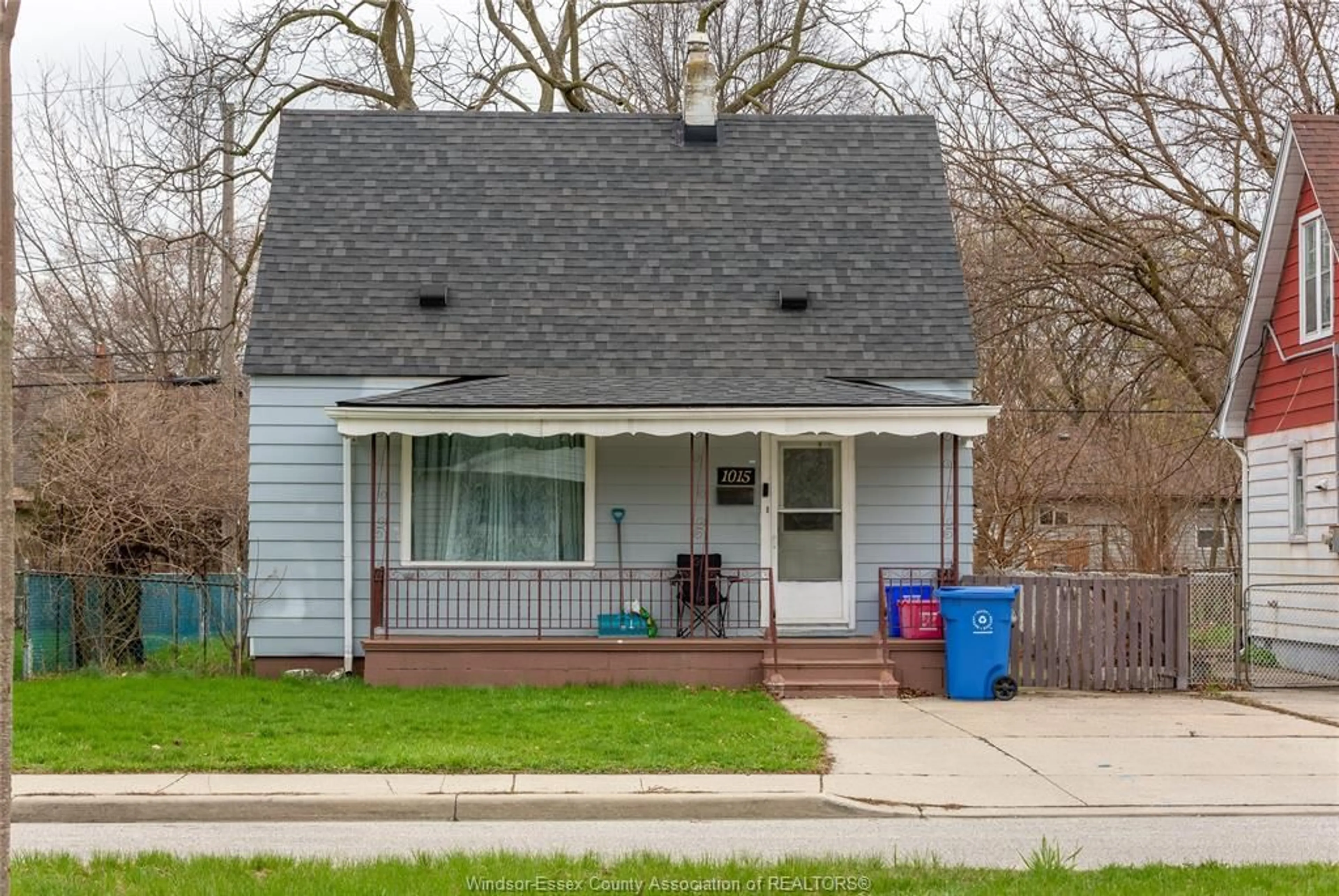 Home with vinyl exterior material, street for 1015 PARTINGTON Ave, Windsor Ontario N9B 2P1