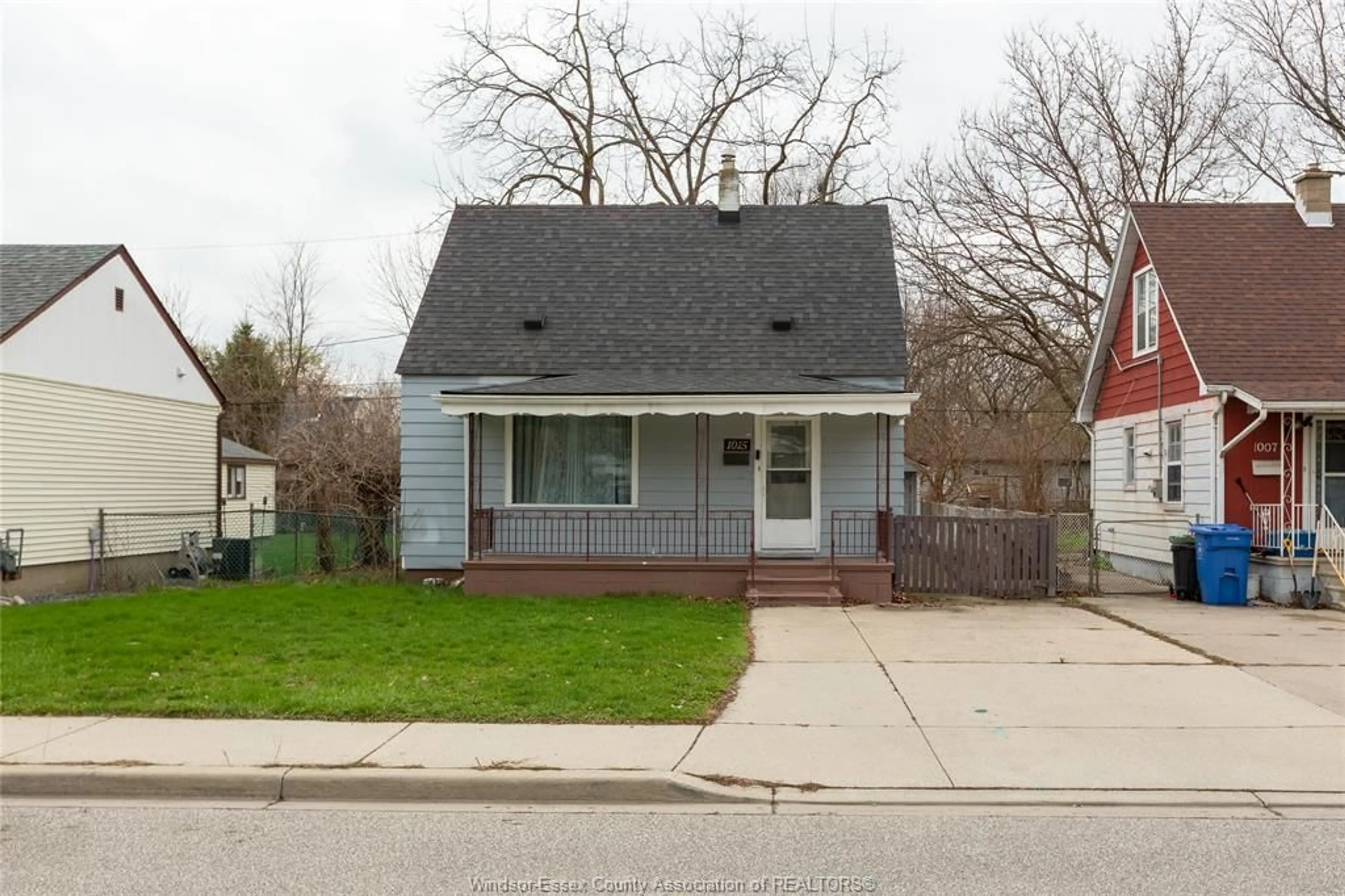 Home with vinyl exterior material, street for 1015 PARTINGTON Ave, Windsor Ontario N9B 2P1