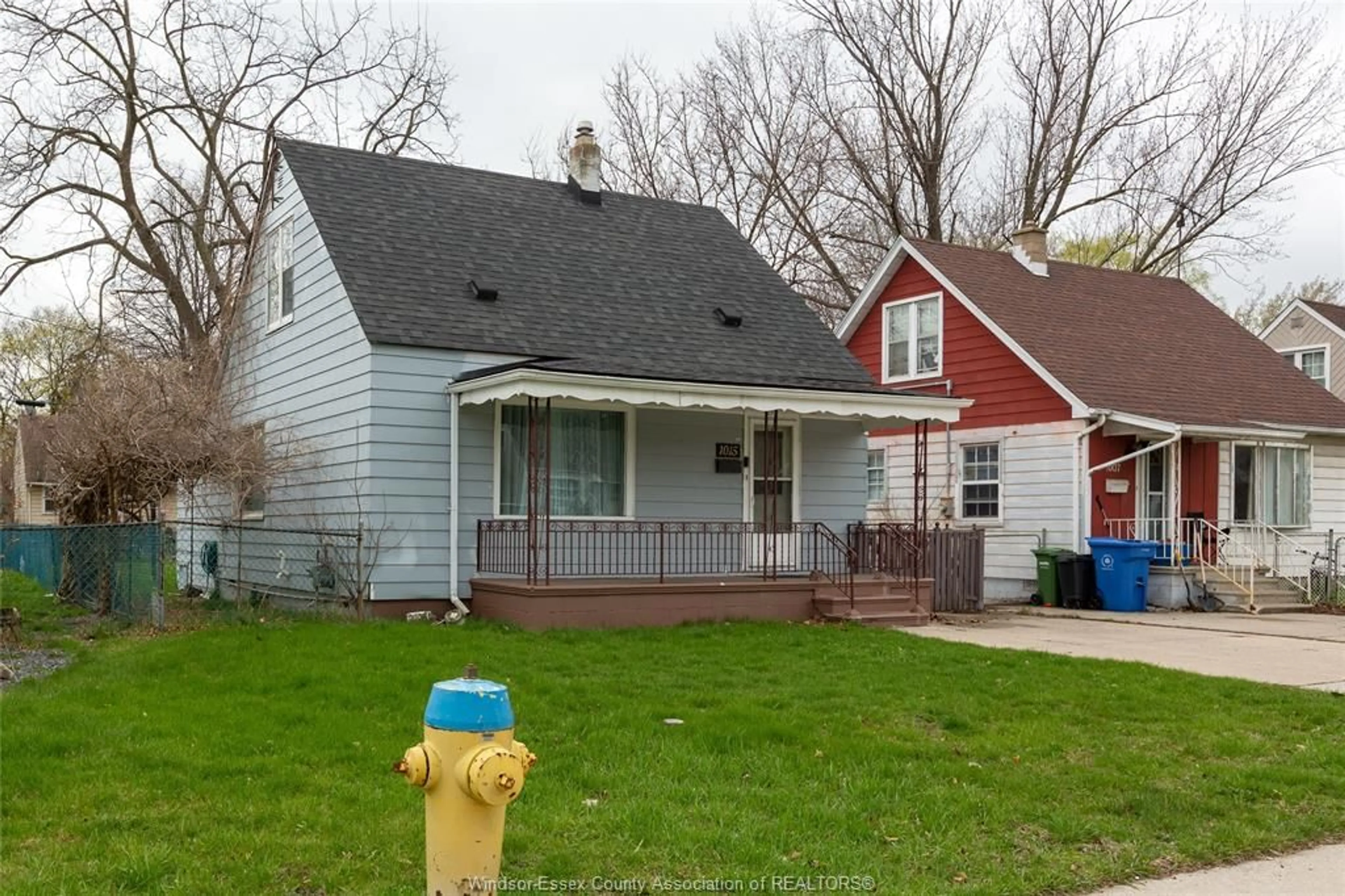 Home with vinyl exterior material, street for 1015 PARTINGTON Ave, Windsor Ontario N9B 2P1