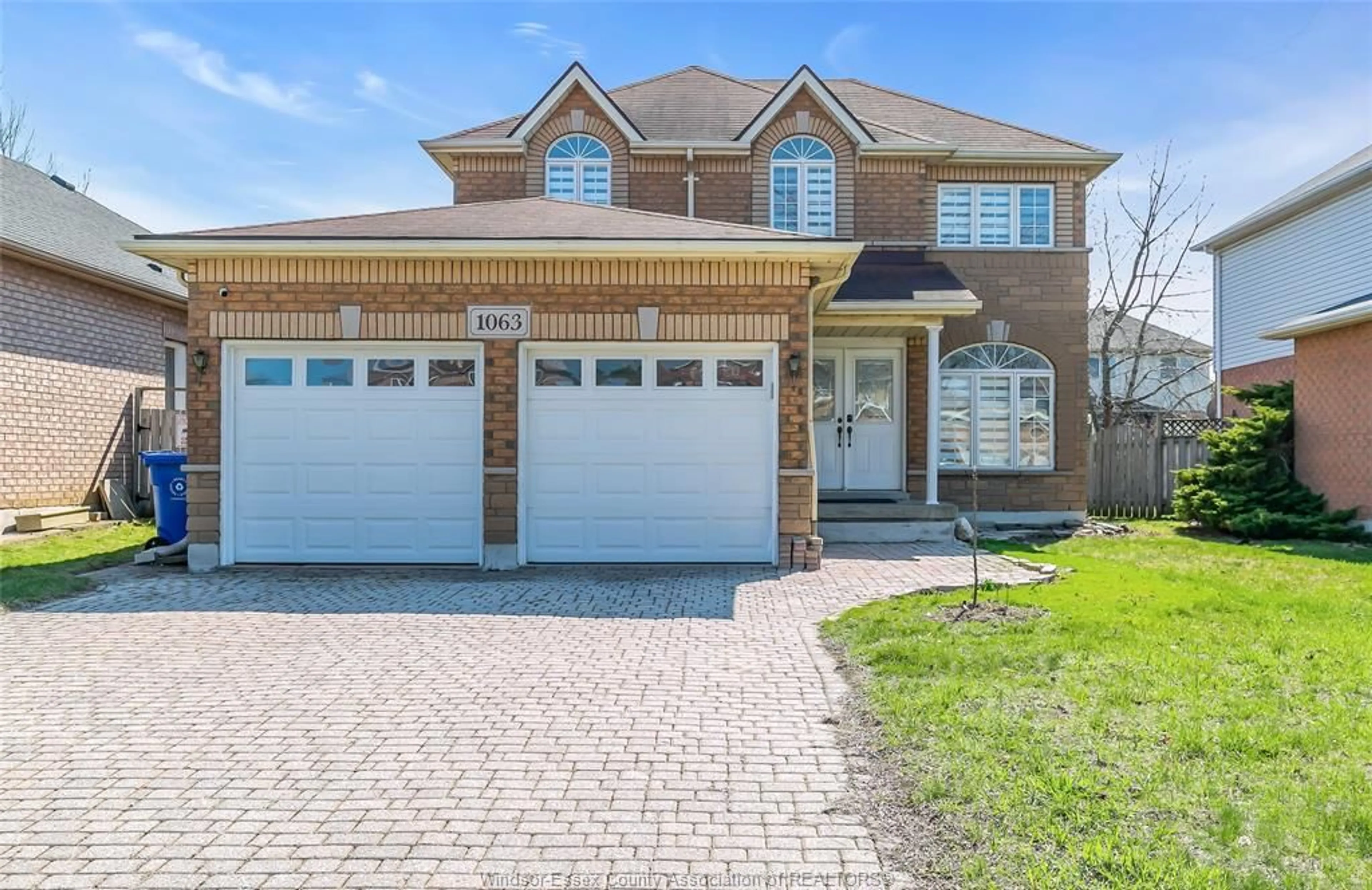 Home with brick exterior material, street for 1063 Peach Blossom Cres, Windsor Ontario N9G 2R5