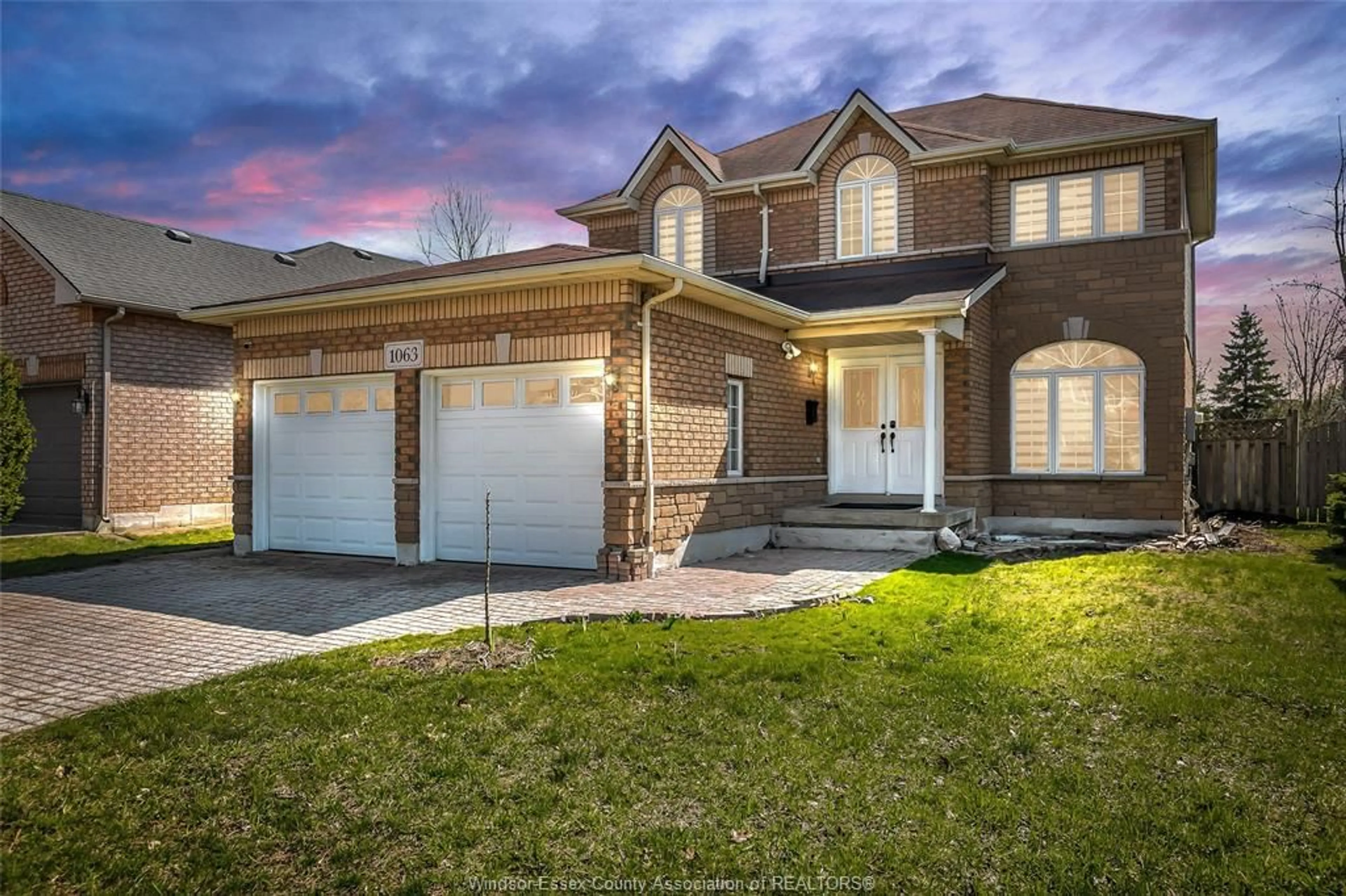 Home with brick exterior material, street for 1063 Peach Blossom Cres, Windsor Ontario N9G 2R5