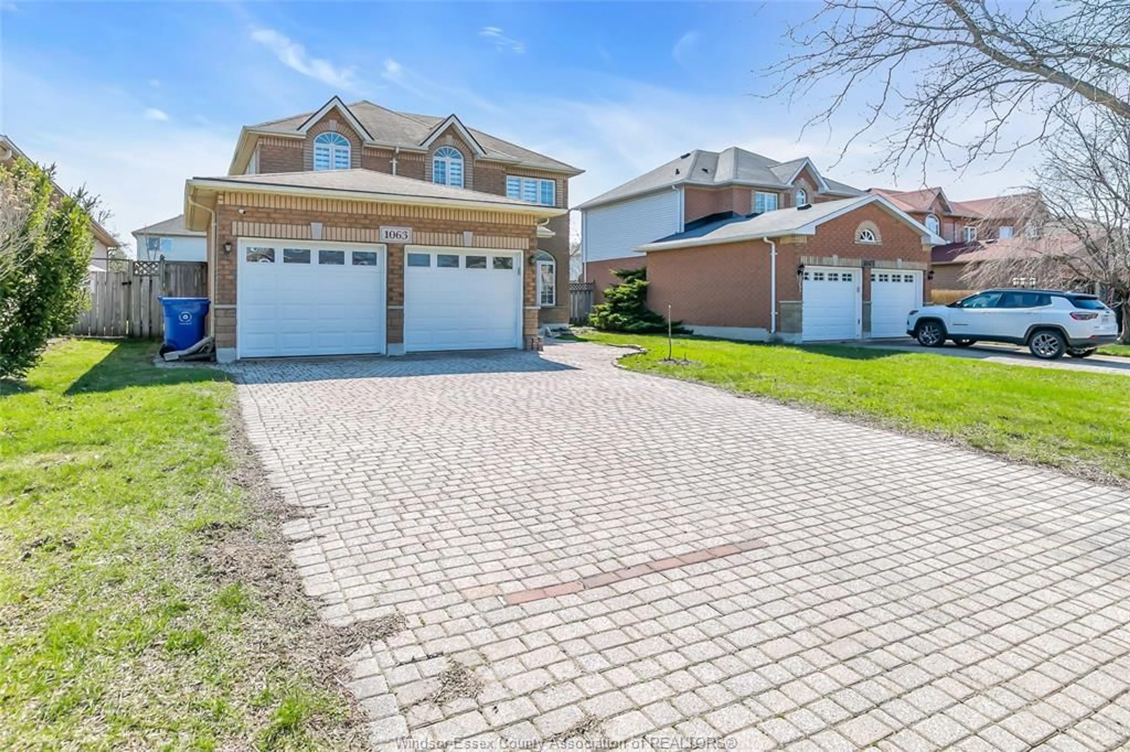 Home with brick exterior material, street for 1063 Peach Blossom Cres, Windsor Ontario N9G 2R5
