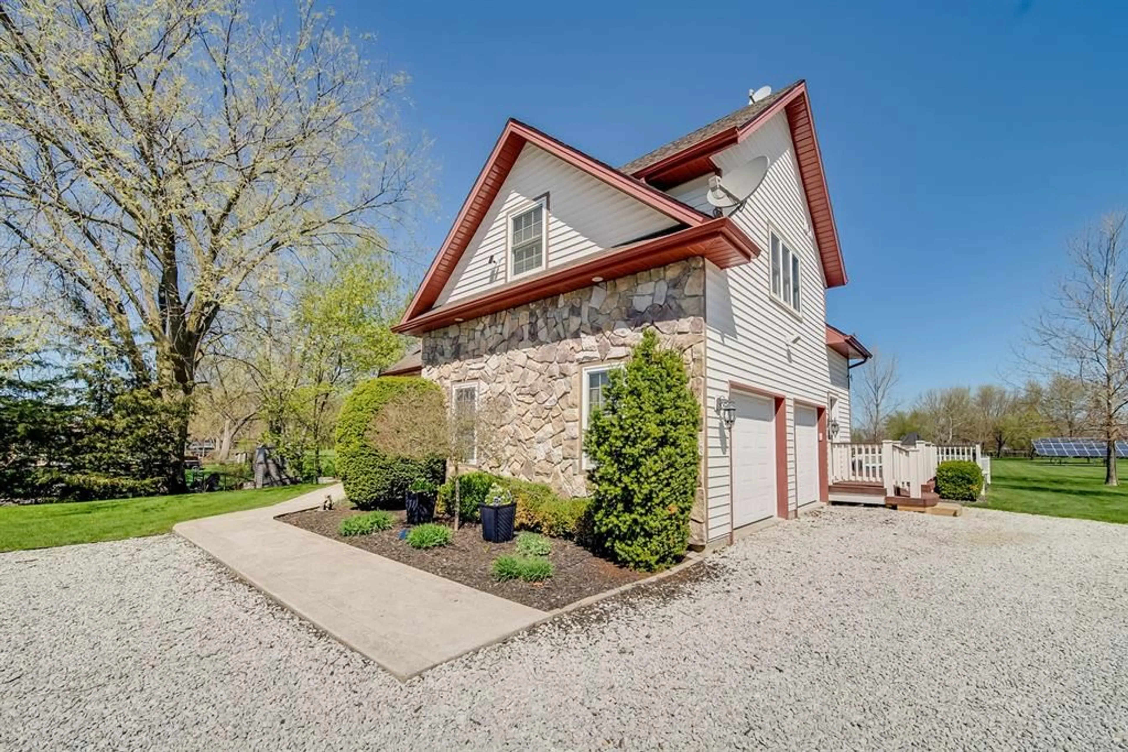 Home with brick exterior material, street for 1332 COUNTY 22 Rd, Lakeshore Ontario N0R 1A0