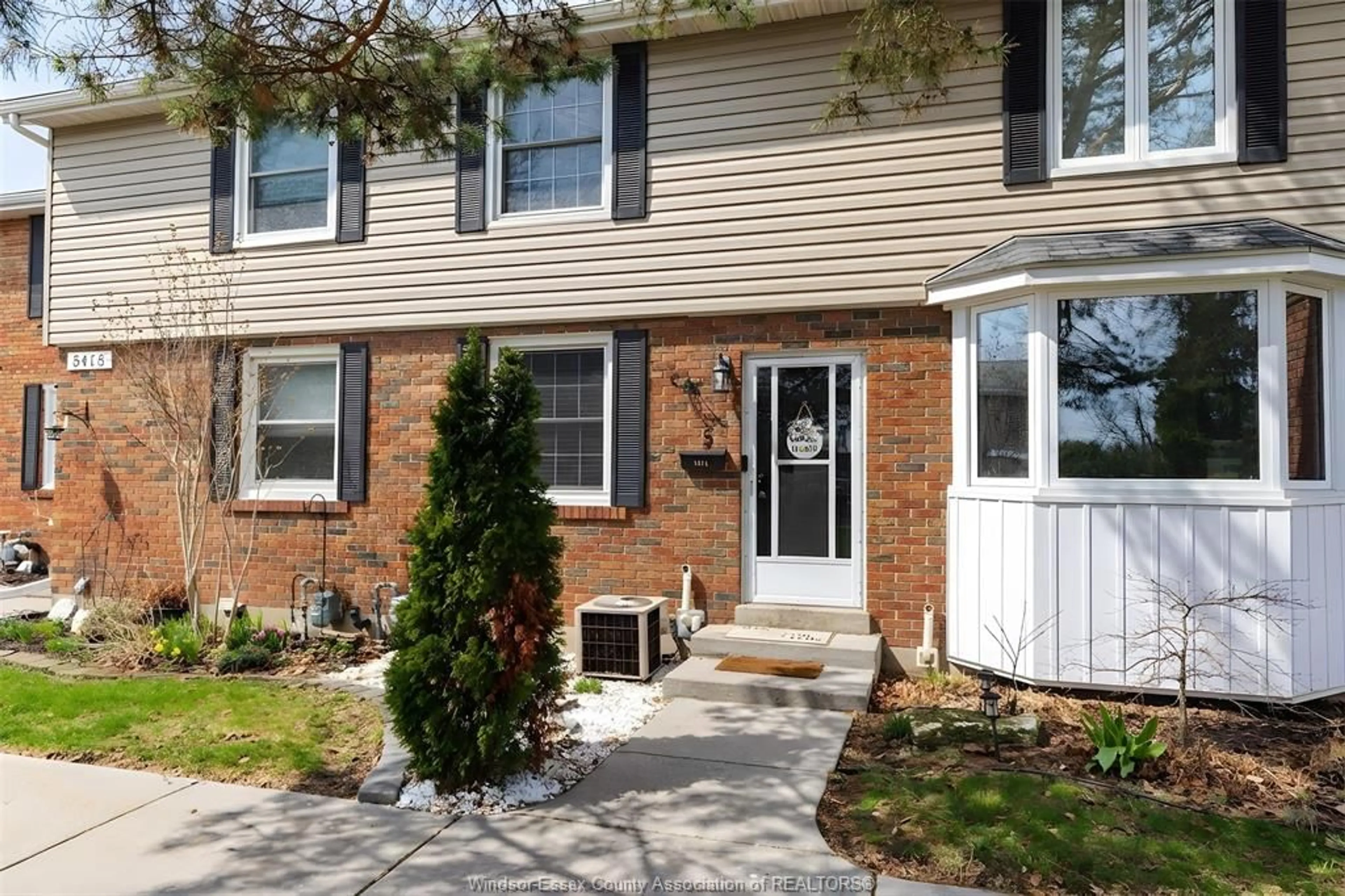 Home with vinyl exterior material, street for 8418 Little River Rd #5, Windsor Ontario N8S 2B5