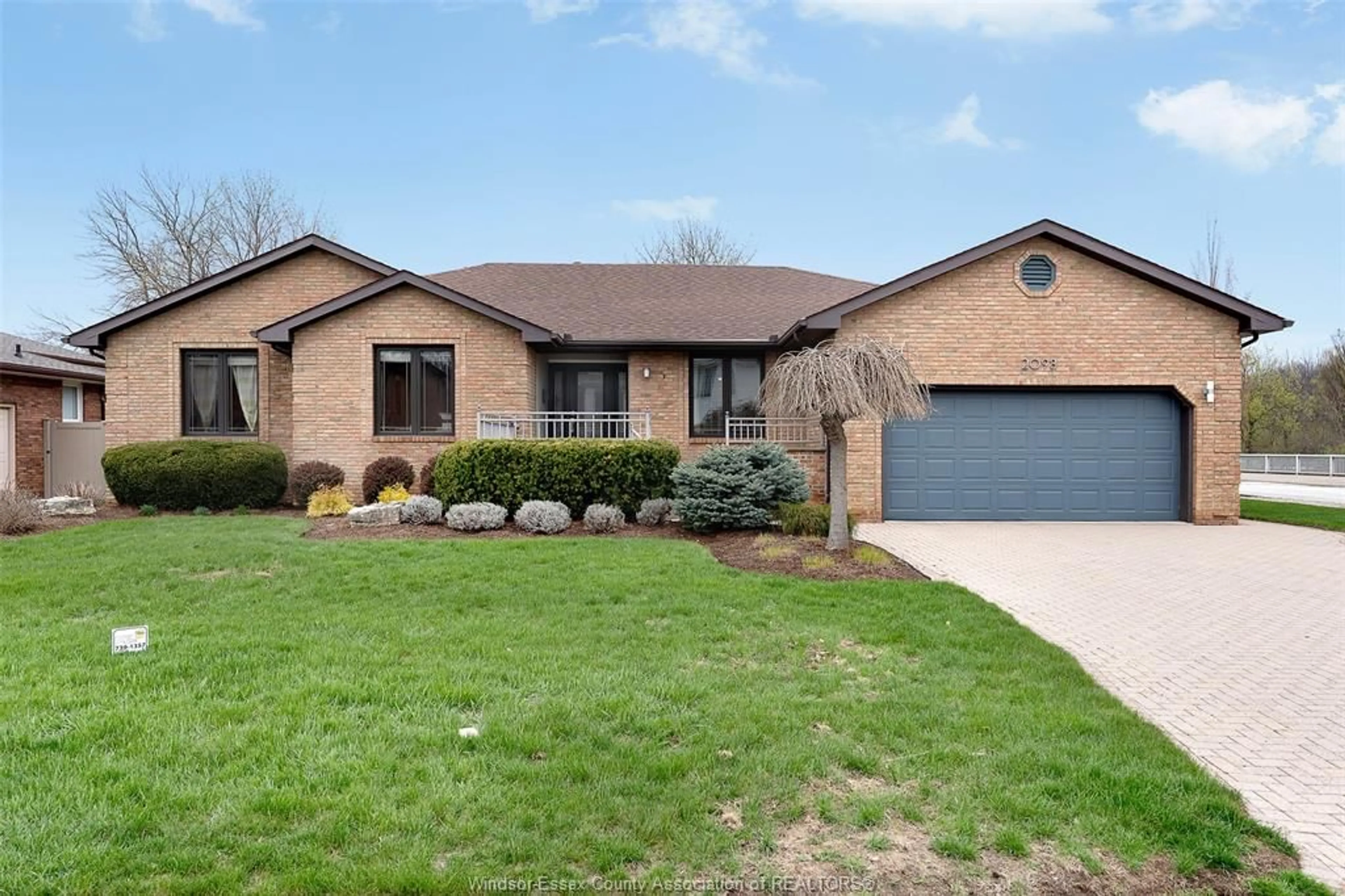 Home with brick exterior material, street for 2098 EDGEMORE Ave, LaSalle Ontario N9H 2K1