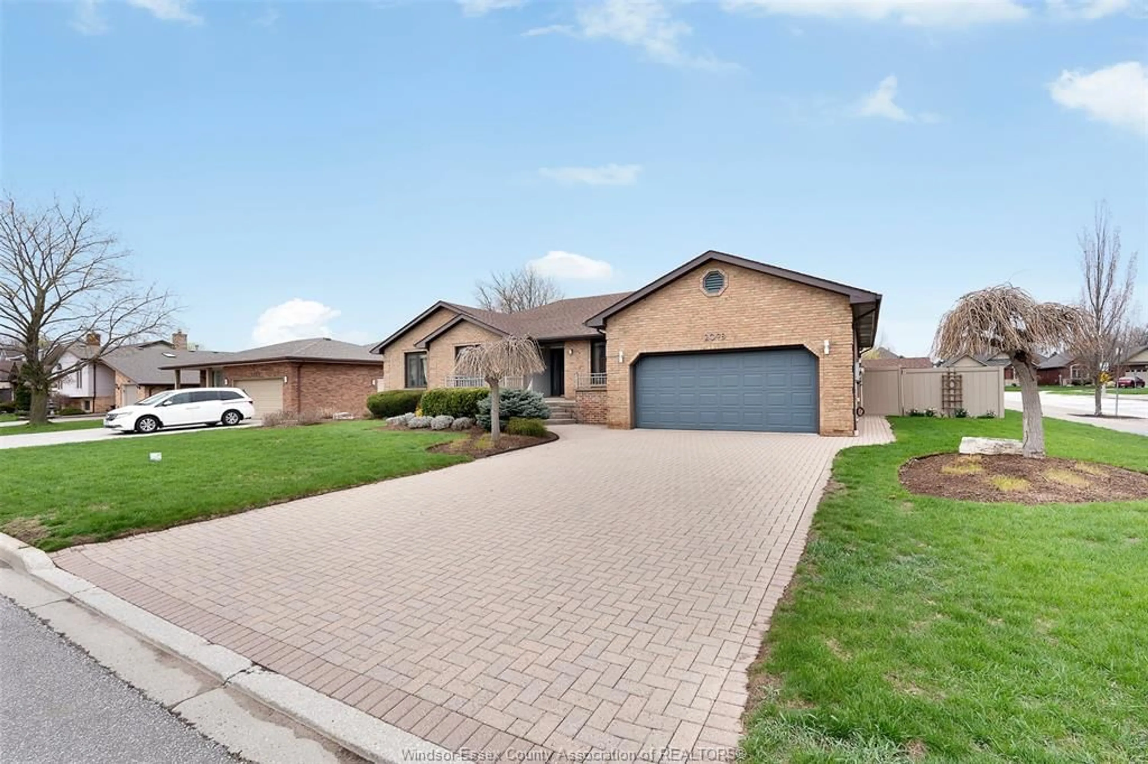 Home with brick exterior material, street for 2098 EDGEMORE Ave, LaSalle Ontario N9H 2K1