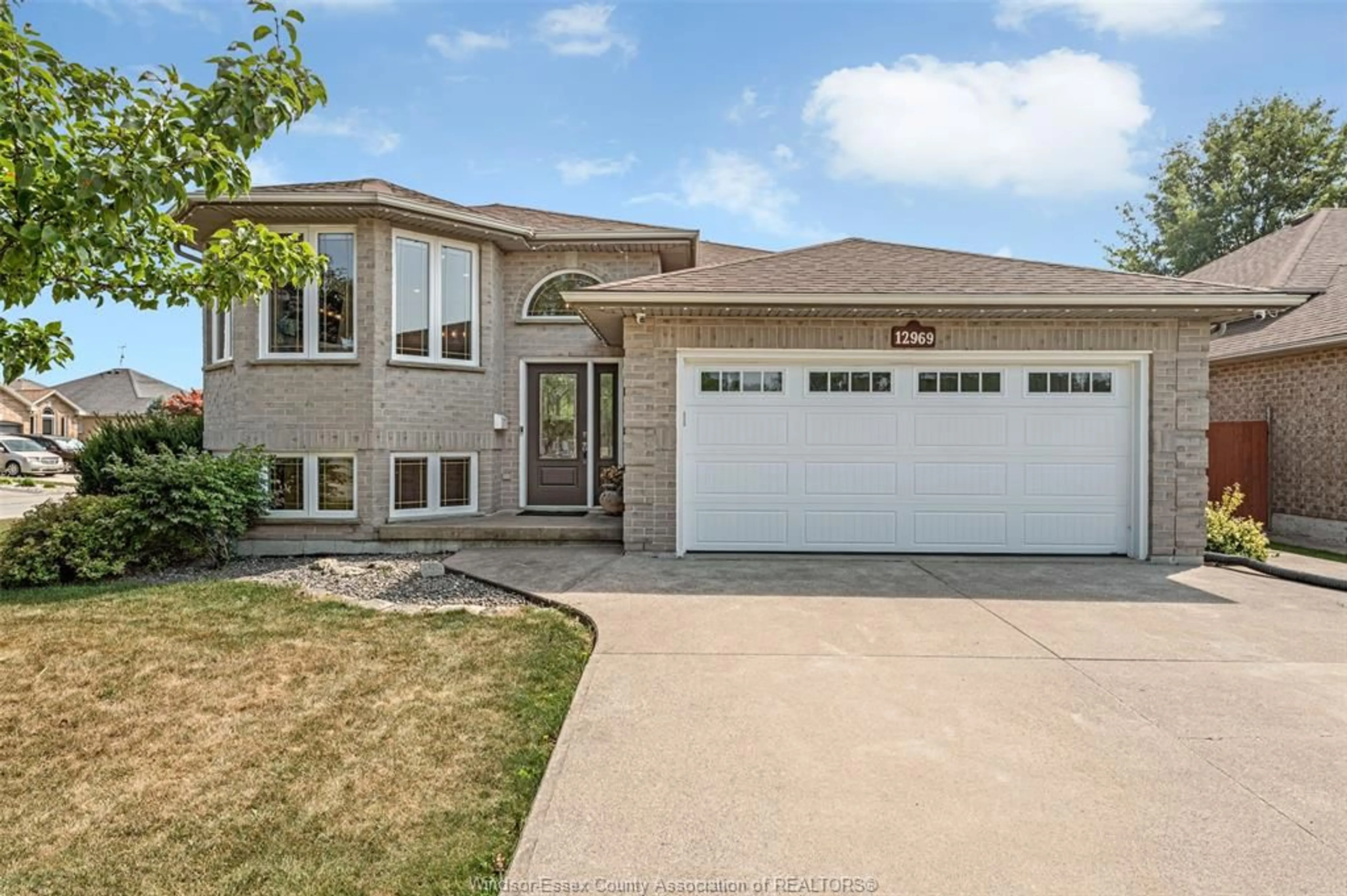 Home with vinyl exterior material, street for 12969 LANOUE St, Tecumseh Ontario N8N 5A7