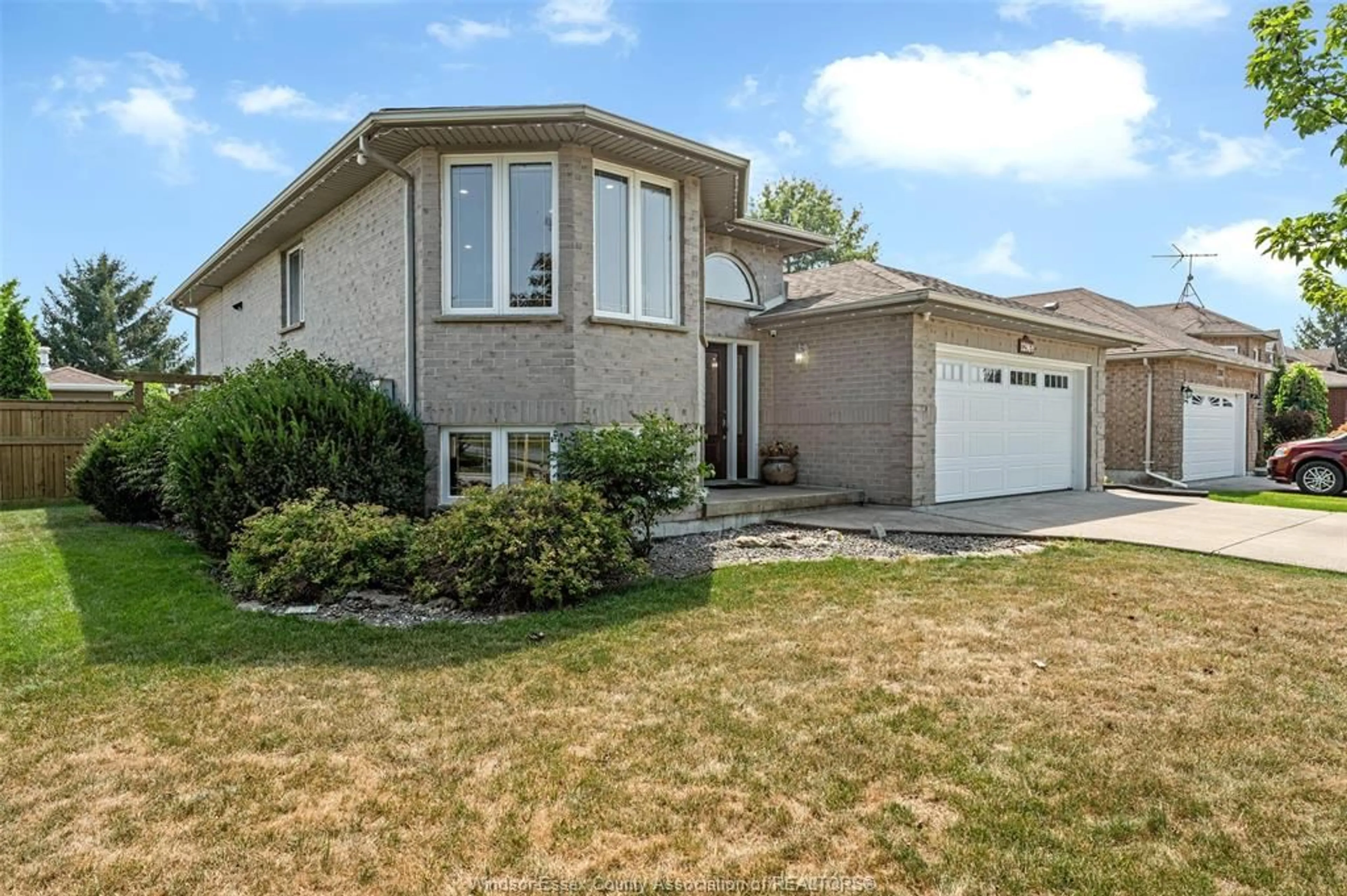 Home with vinyl exterior material, street for 12969 LANOUE St, Tecumseh Ontario N8N 5A7