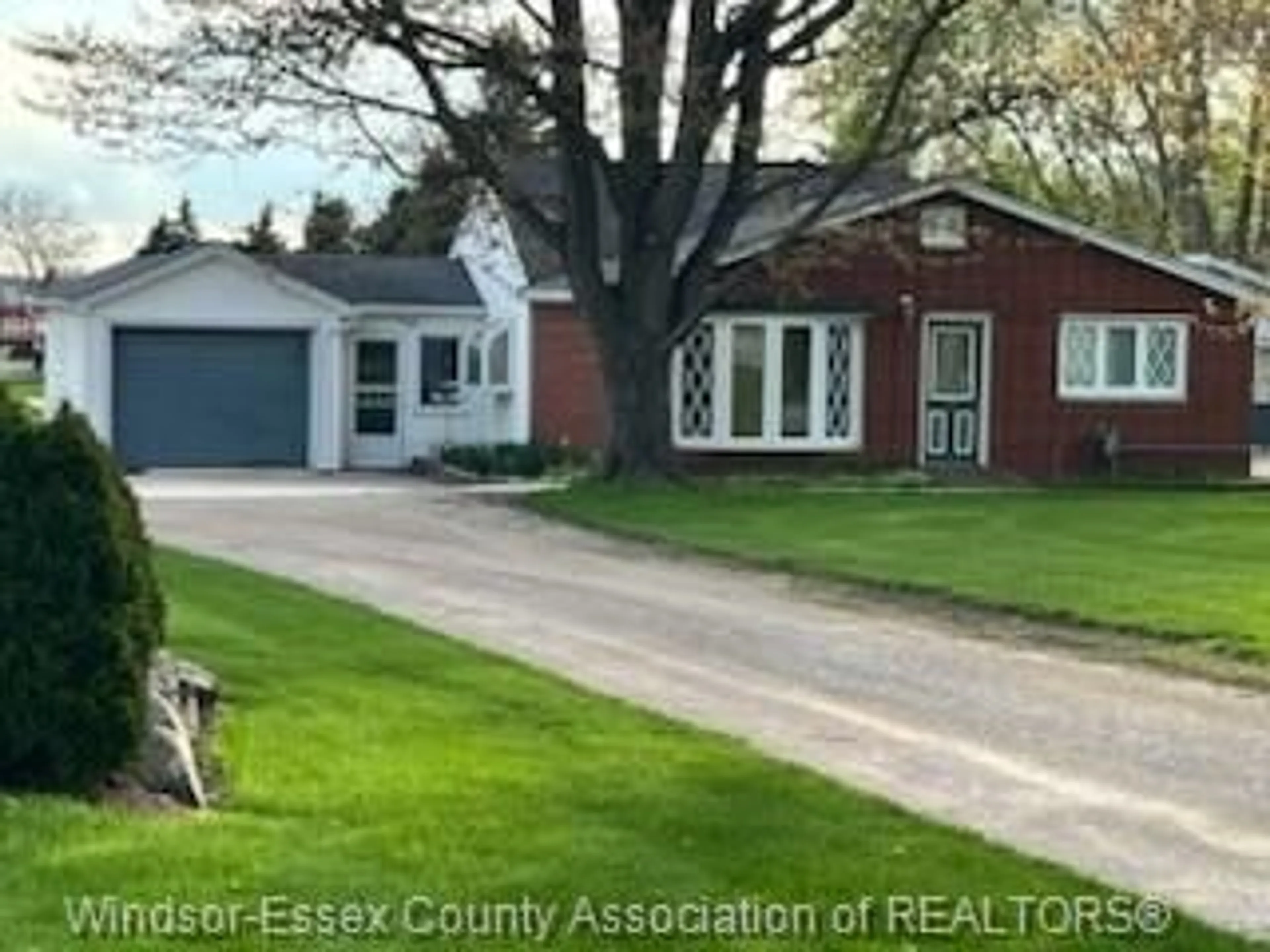 A pic from outside/outdoor area/front of a property/back of a property/a pic from drone, street for 317 COUNTY RD 34, Kingsville Ontario N8M 2X5