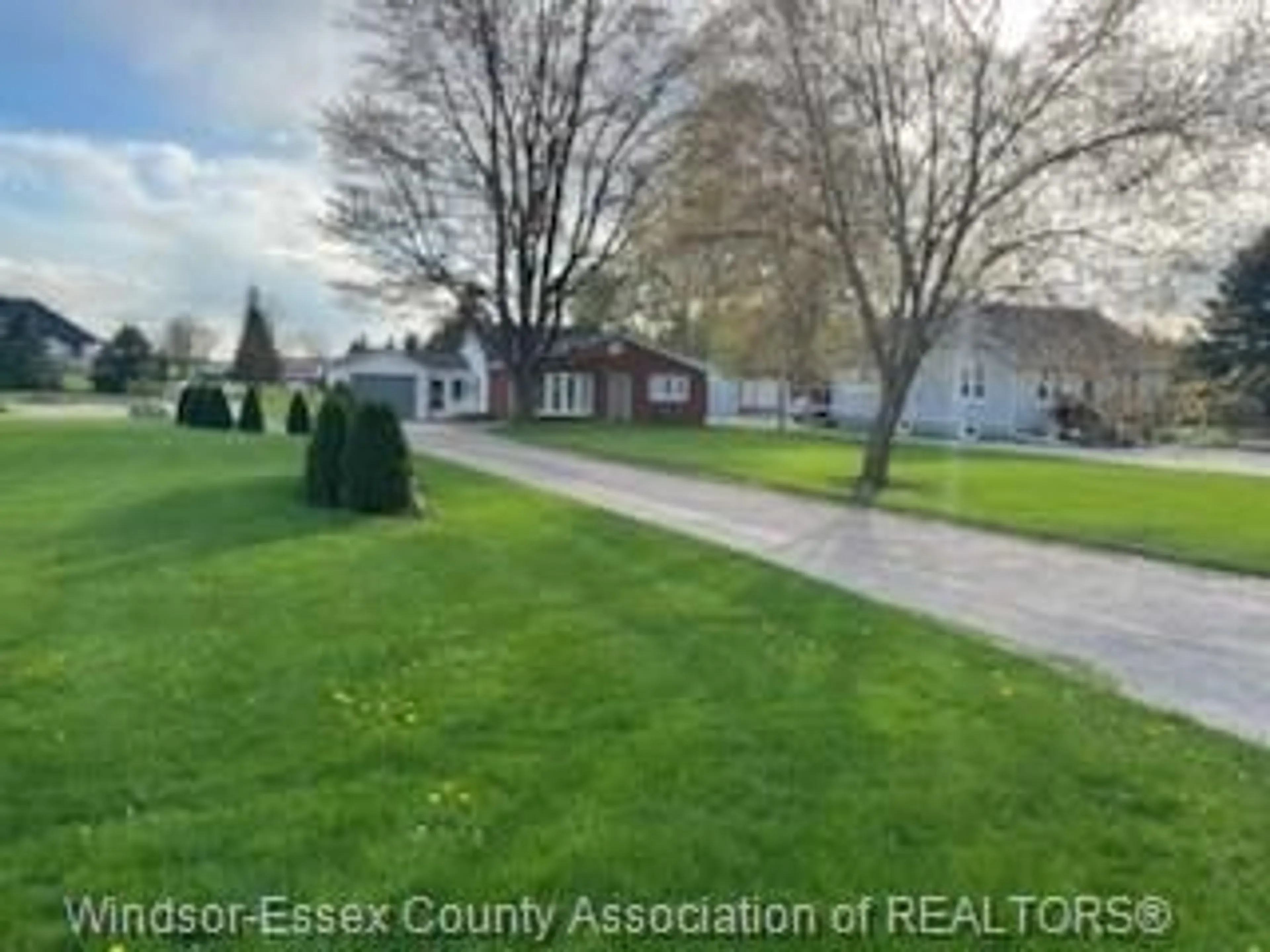 A pic from outside/outdoor area/front of a property/back of a property/a pic from drone, street for 317 COUNTY RD 34, Kingsville Ontario N8M 2X5