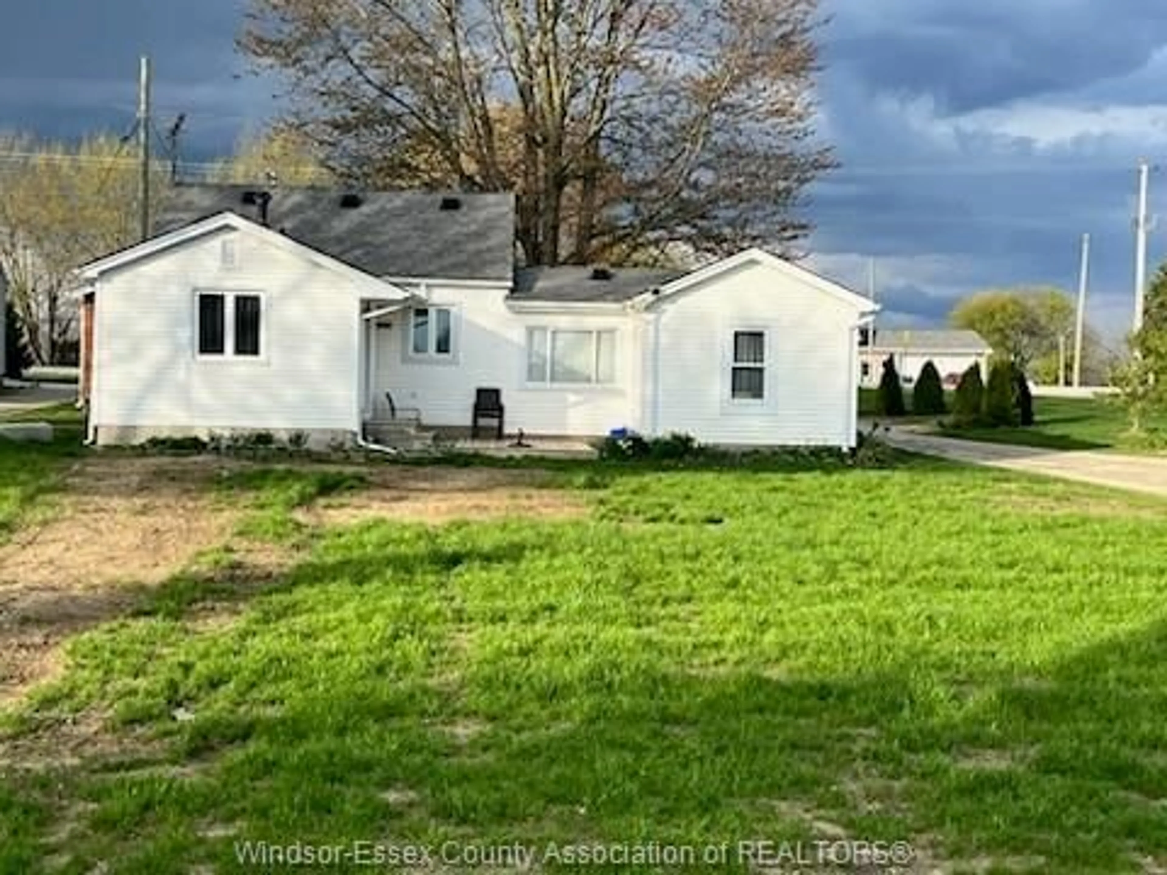 A pic from outside/outdoor area/front of a property/back of a property/a pic from drone, street for 317 COUNTY RD 34, Kingsville Ontario N8M 2X5