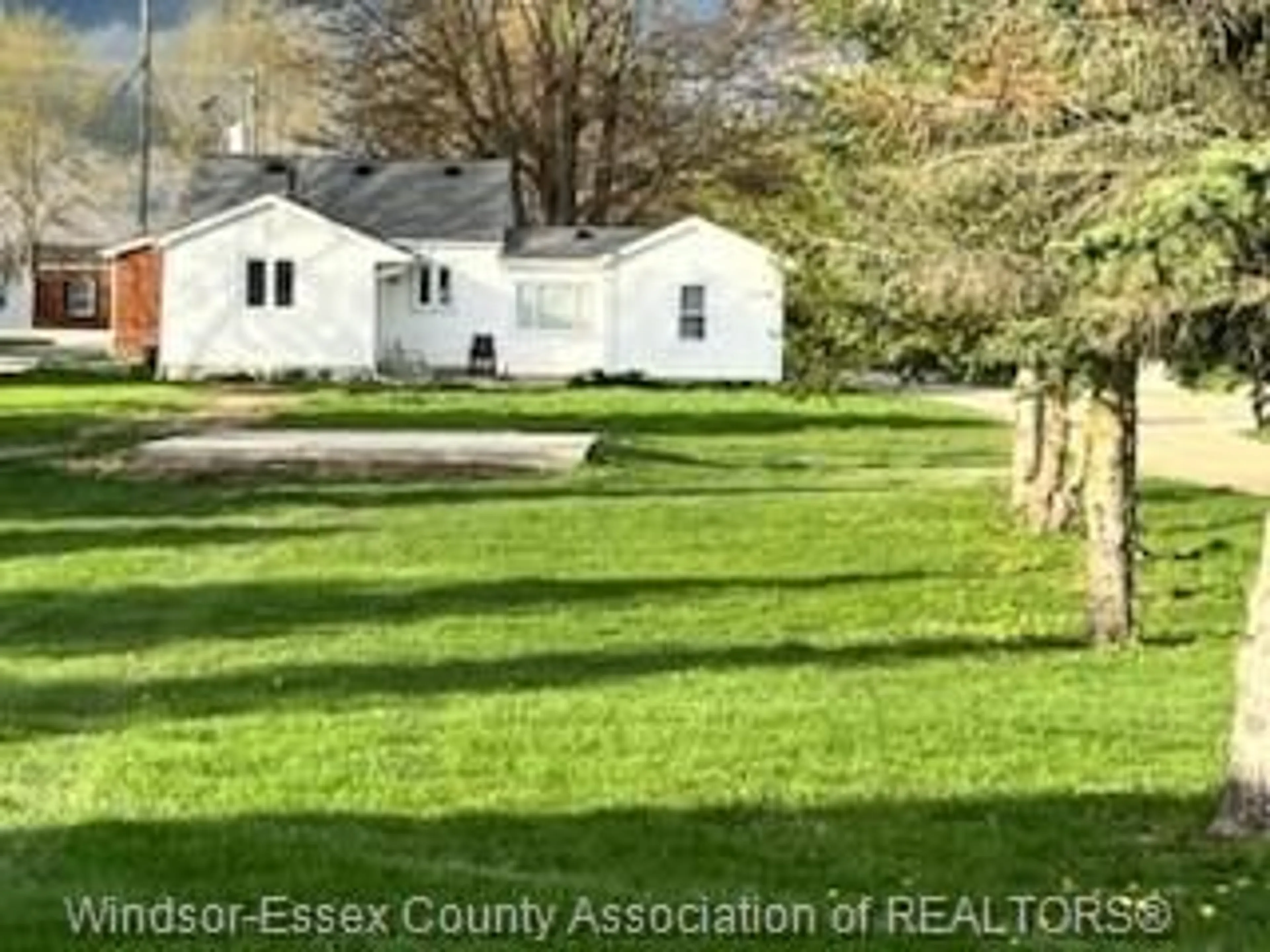 A pic from outside/outdoor area/front of a property/back of a property/a pic from drone, unknown for 317 COUNTY RD 34, Kingsville Ontario N8M 2X5