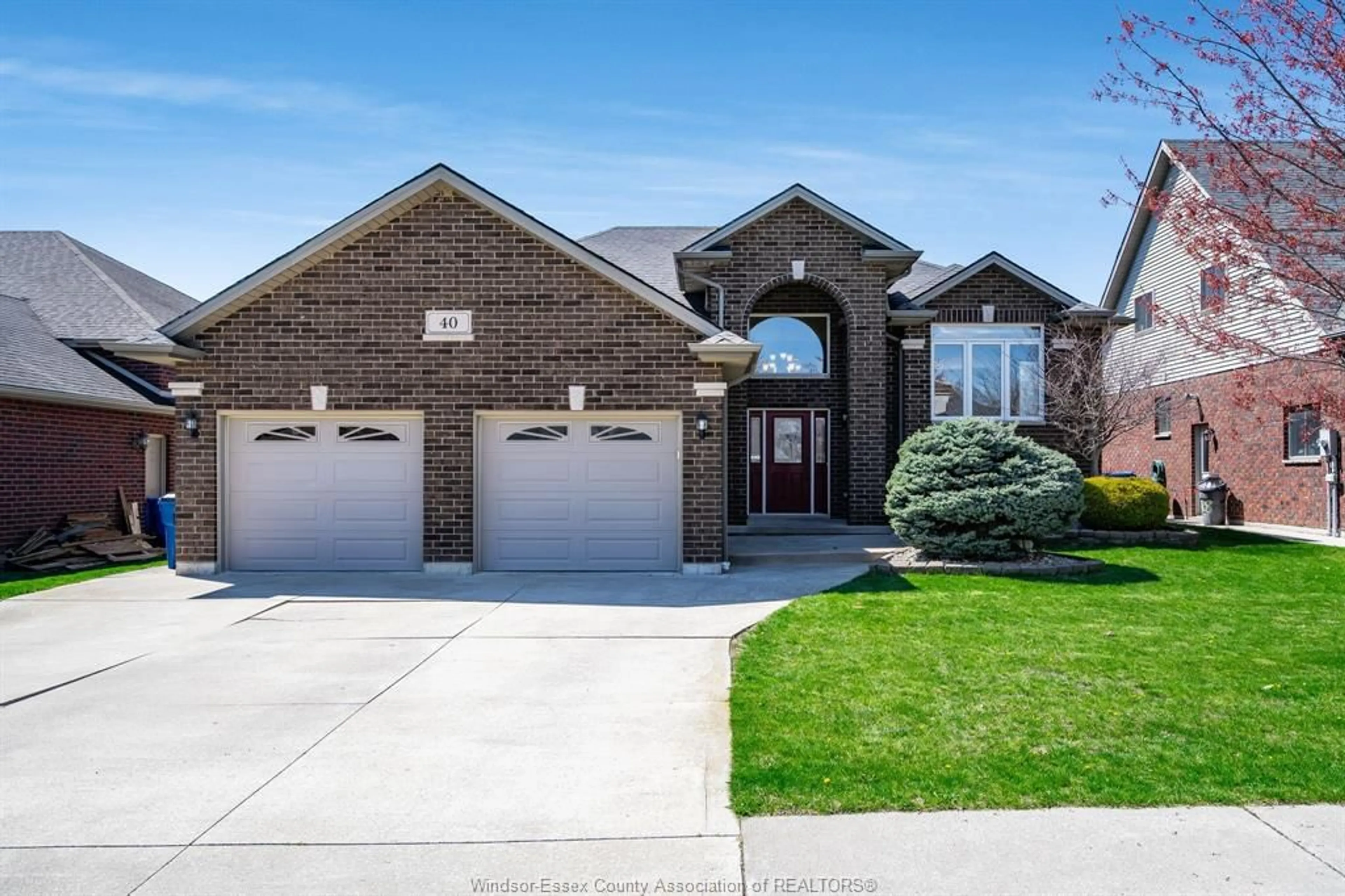 Home with brick exterior material, street for 40 Conservation Blvd, Kingsville Ontario N9Y 4E5