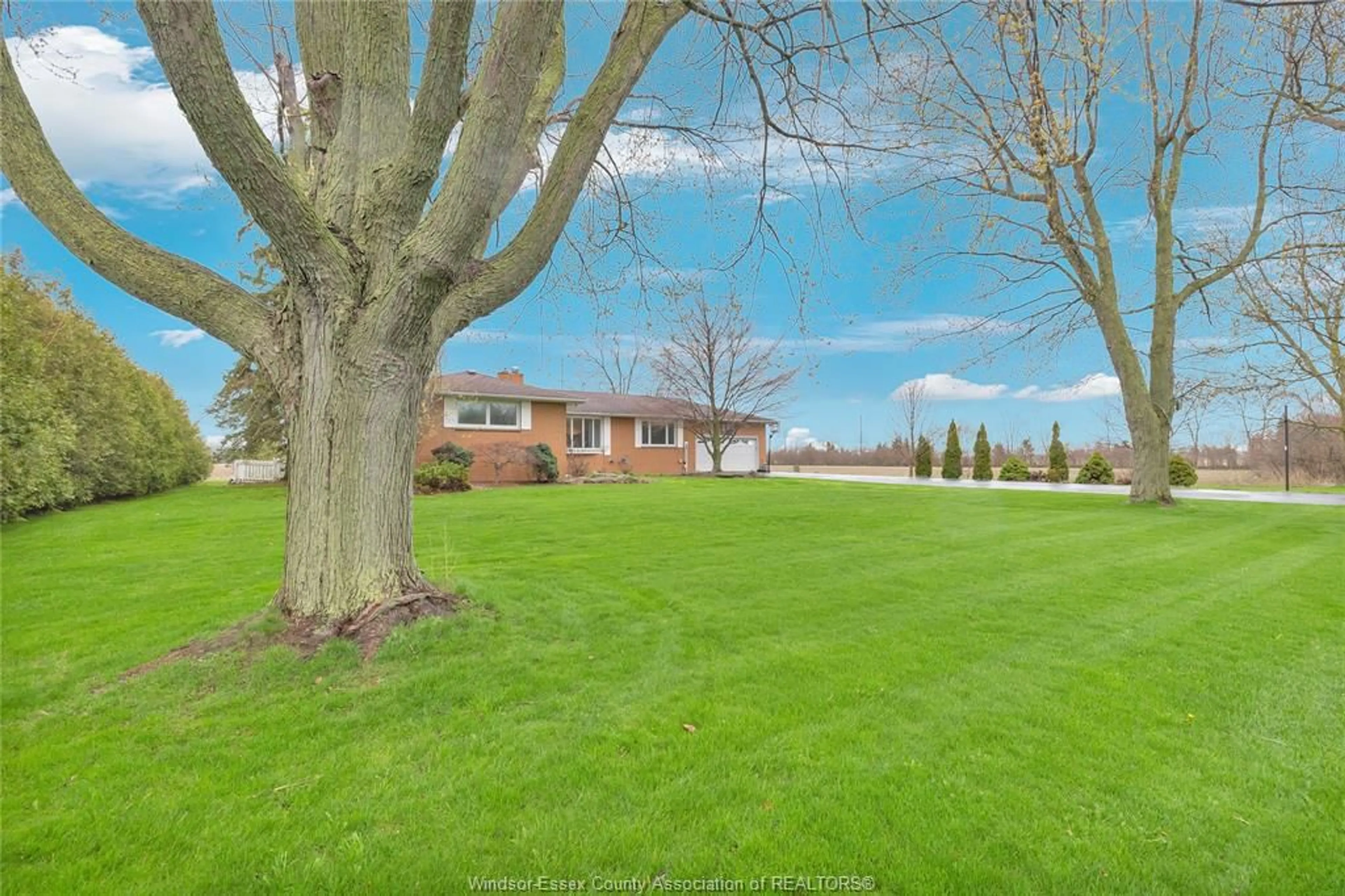 A pic from outside/outdoor area/front of a property/back of a property/a pic from drone, water/lake/river/ocean view for 54 MERSEA ROAD 12, Leamington Ontario N8H 3V7