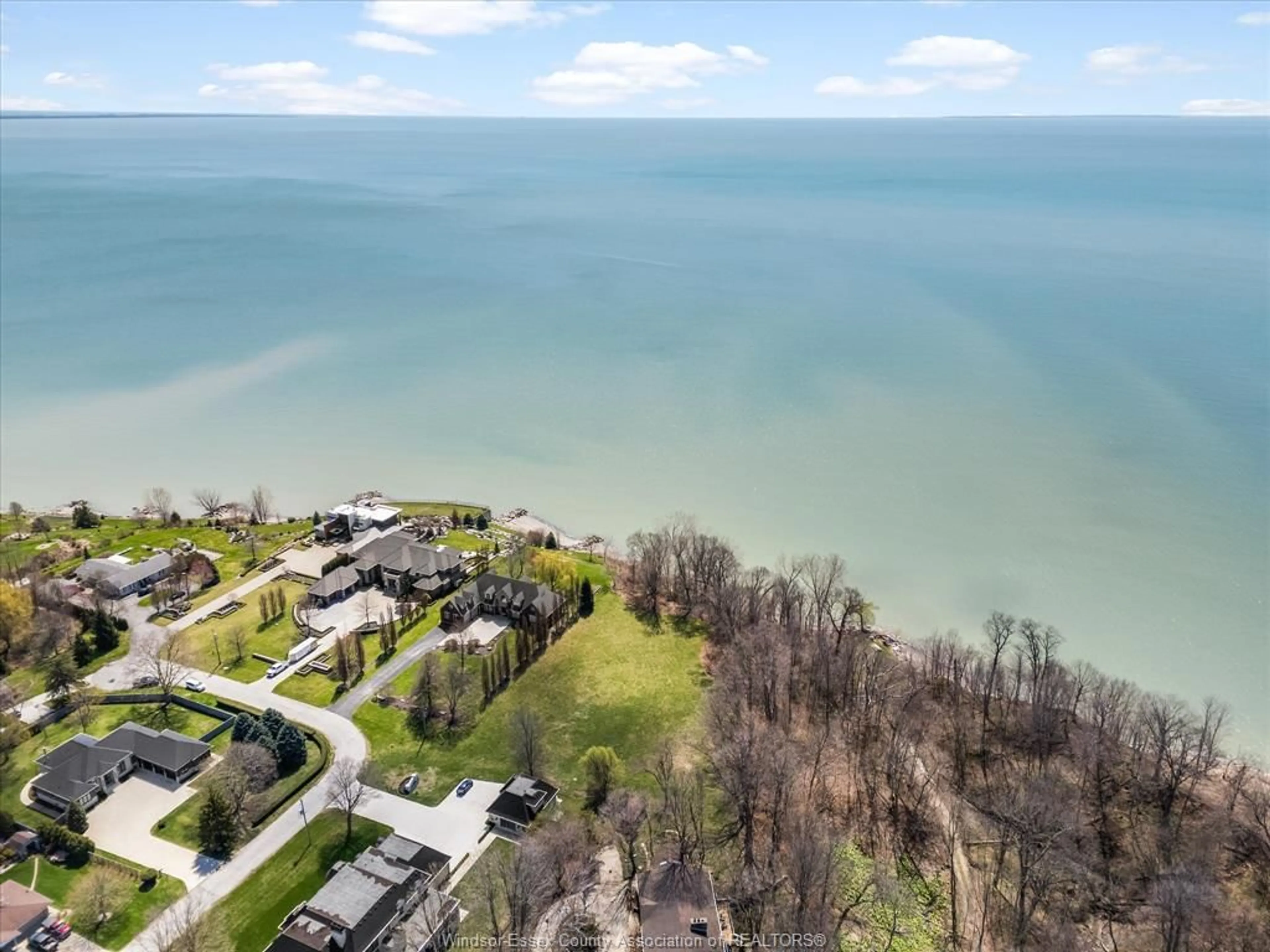 A pic from outside/outdoor area/front of a property/back of a property/a pic from drone, water/lake/river/ocean view for 1509 KENYON POINT Rd, Kingsville Ontario N9Y 0C6