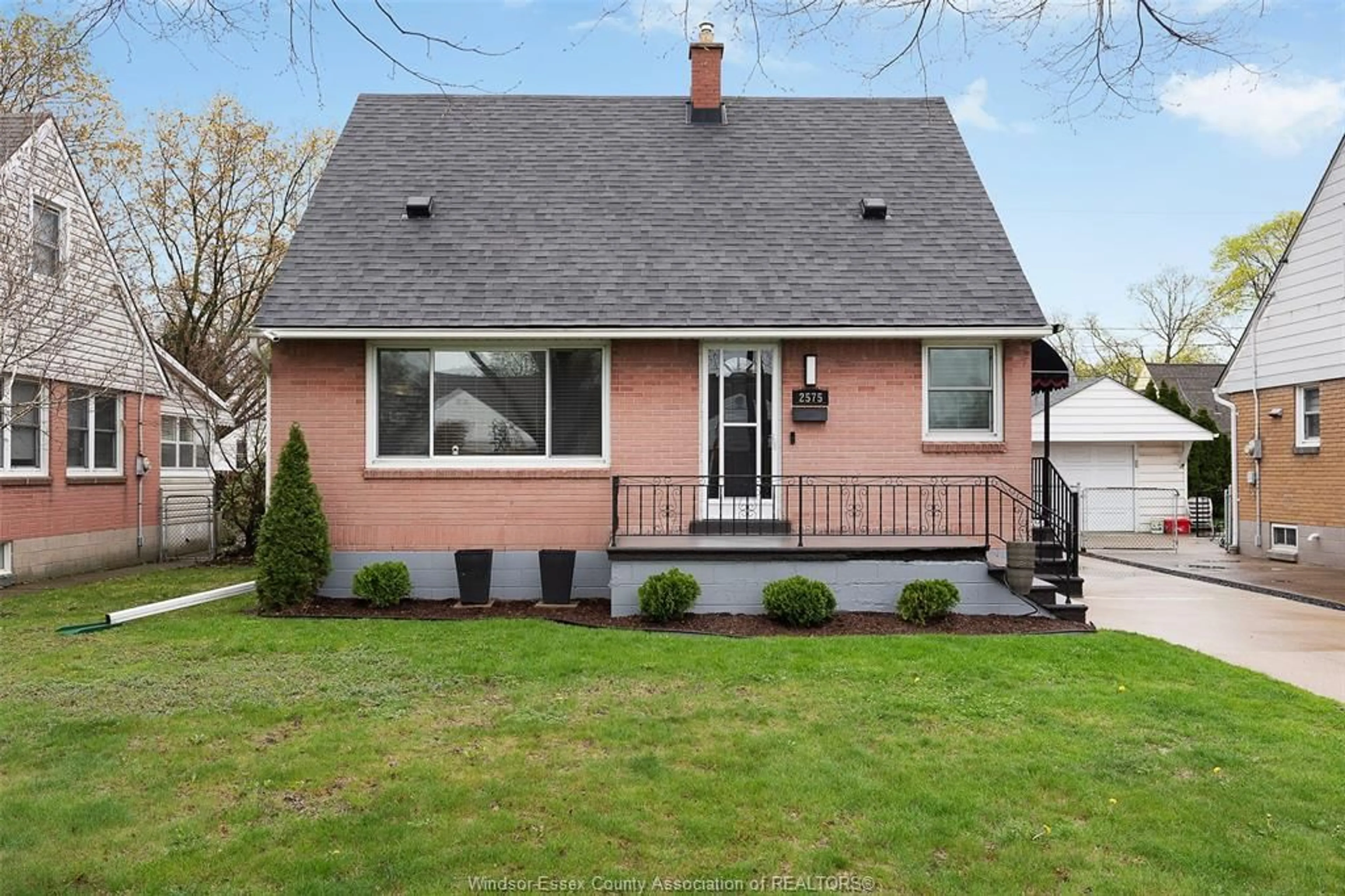 Home with vinyl exterior material, street for 2575 Kildare Rd, Windsor Ontario N8W 2Y4