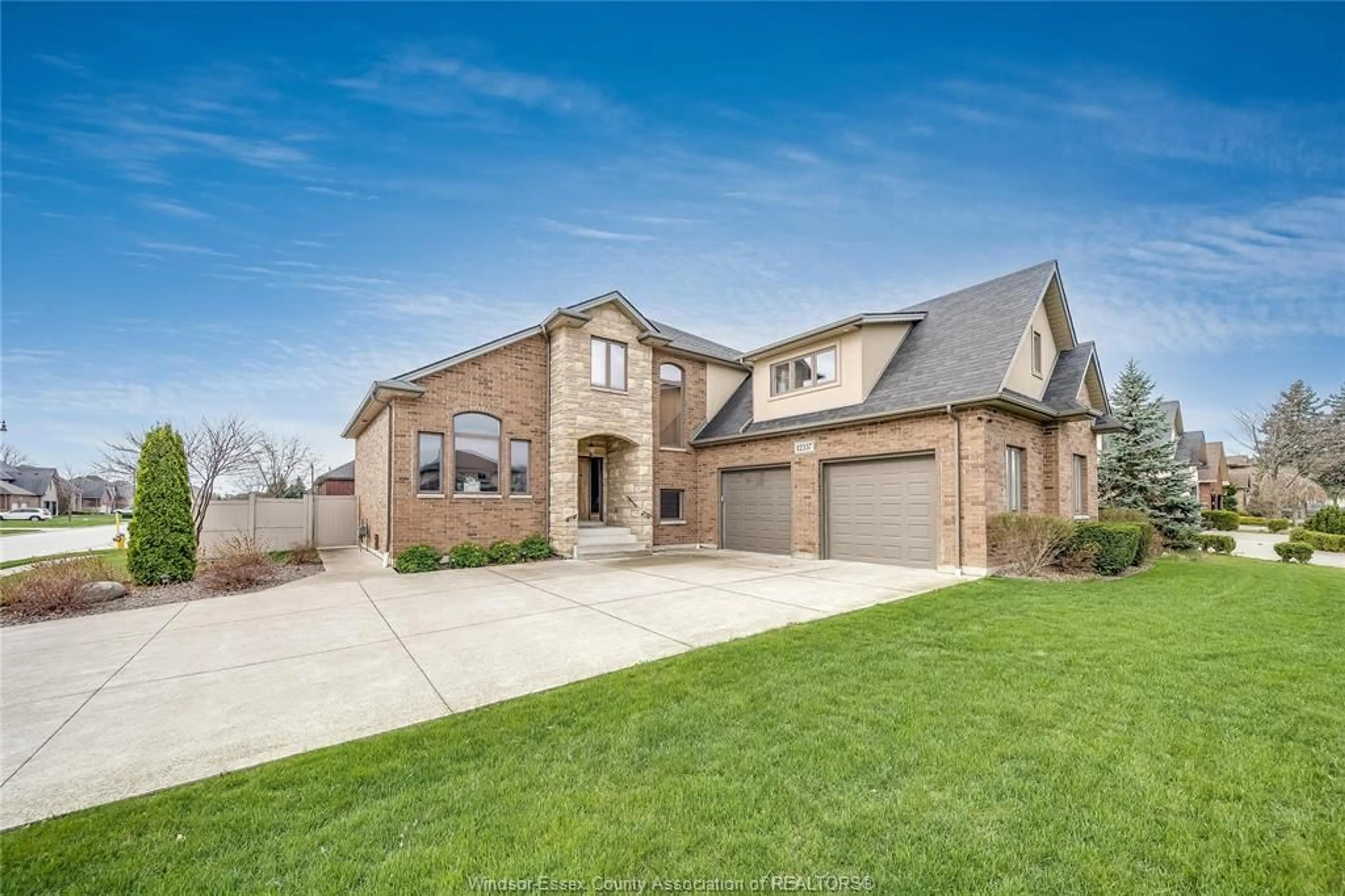 Home with brick exterior material, street for 12337 CANDLEWOOD Dr, Tecumseh Ontario N9K 0A3